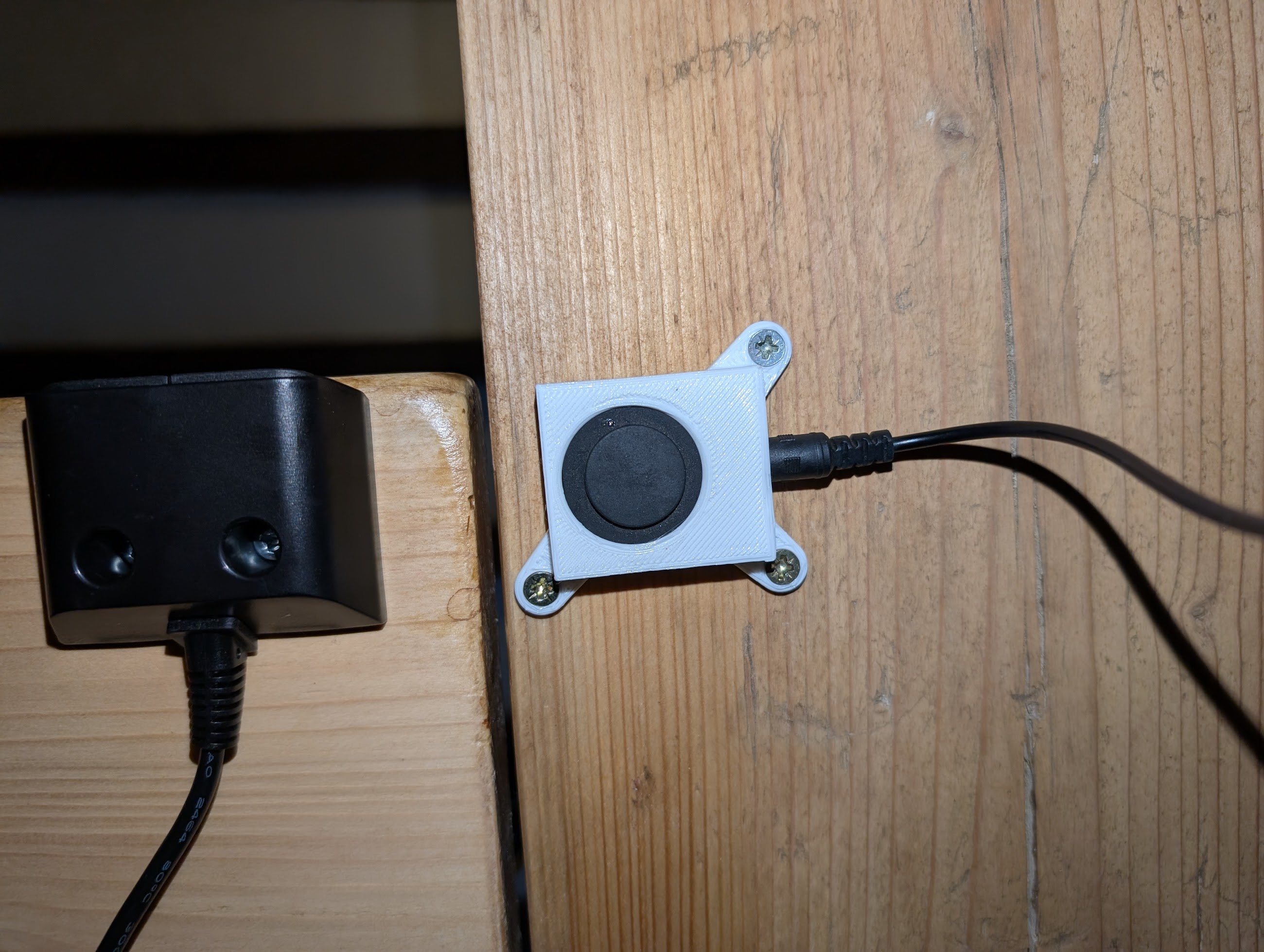 KVM switch button mount