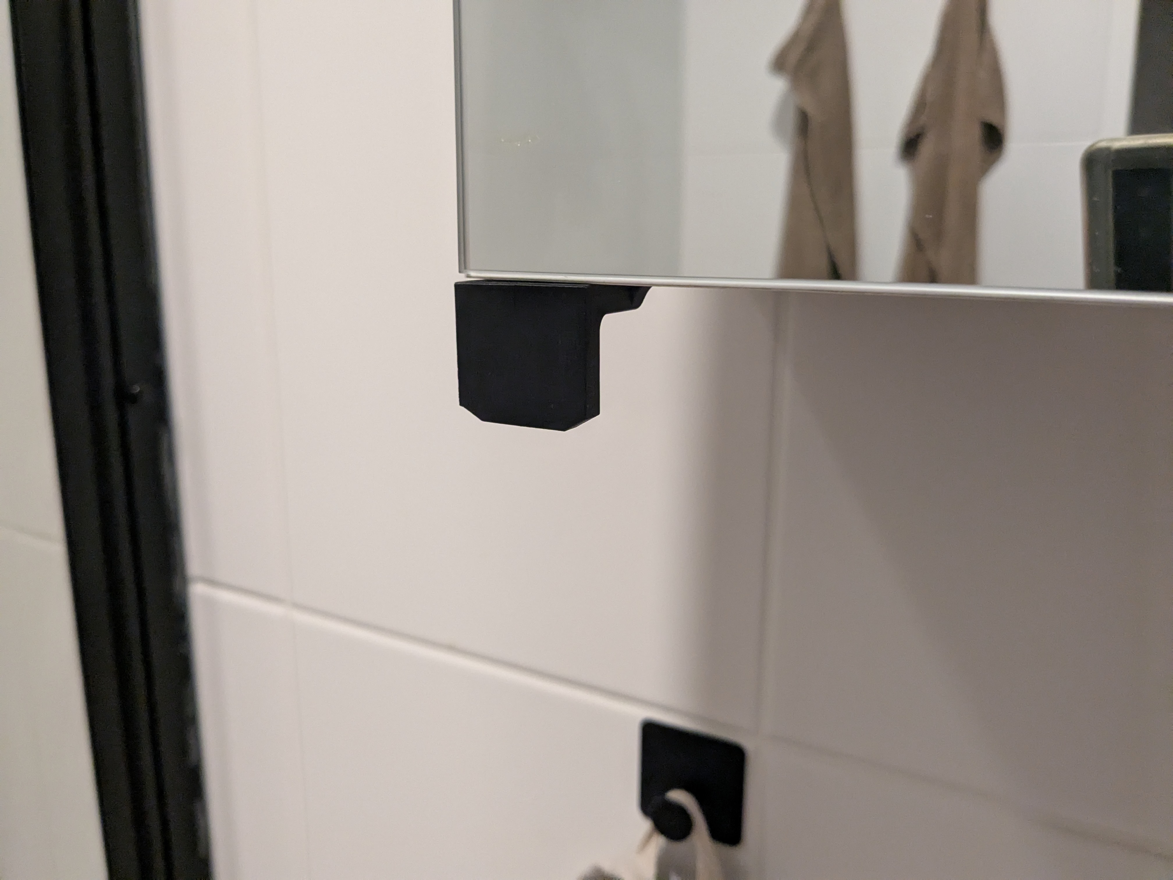 Handle for mirrorcabinet