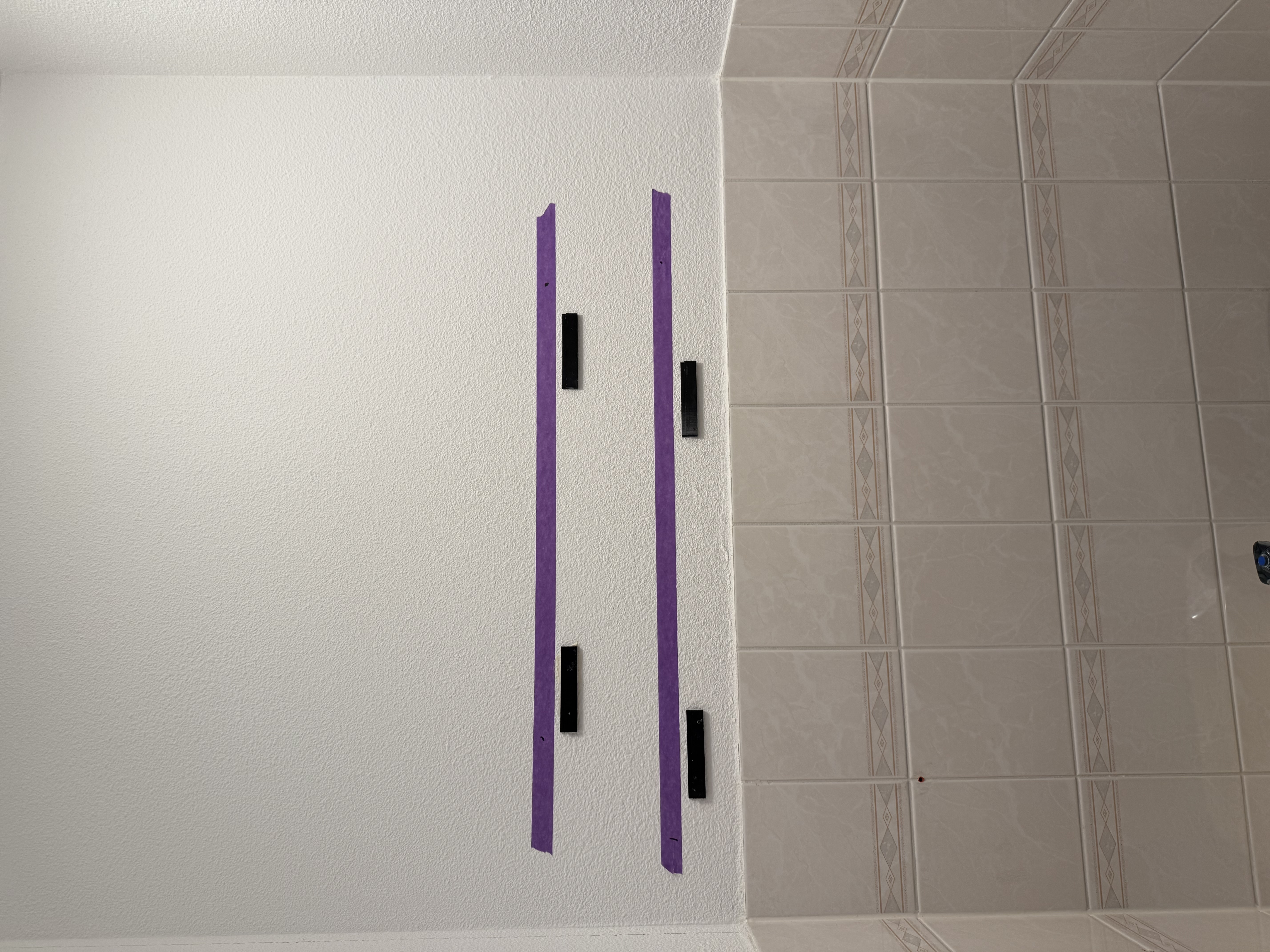 Slim removable wall mount for hanging pictures or mirrors with double sided tape