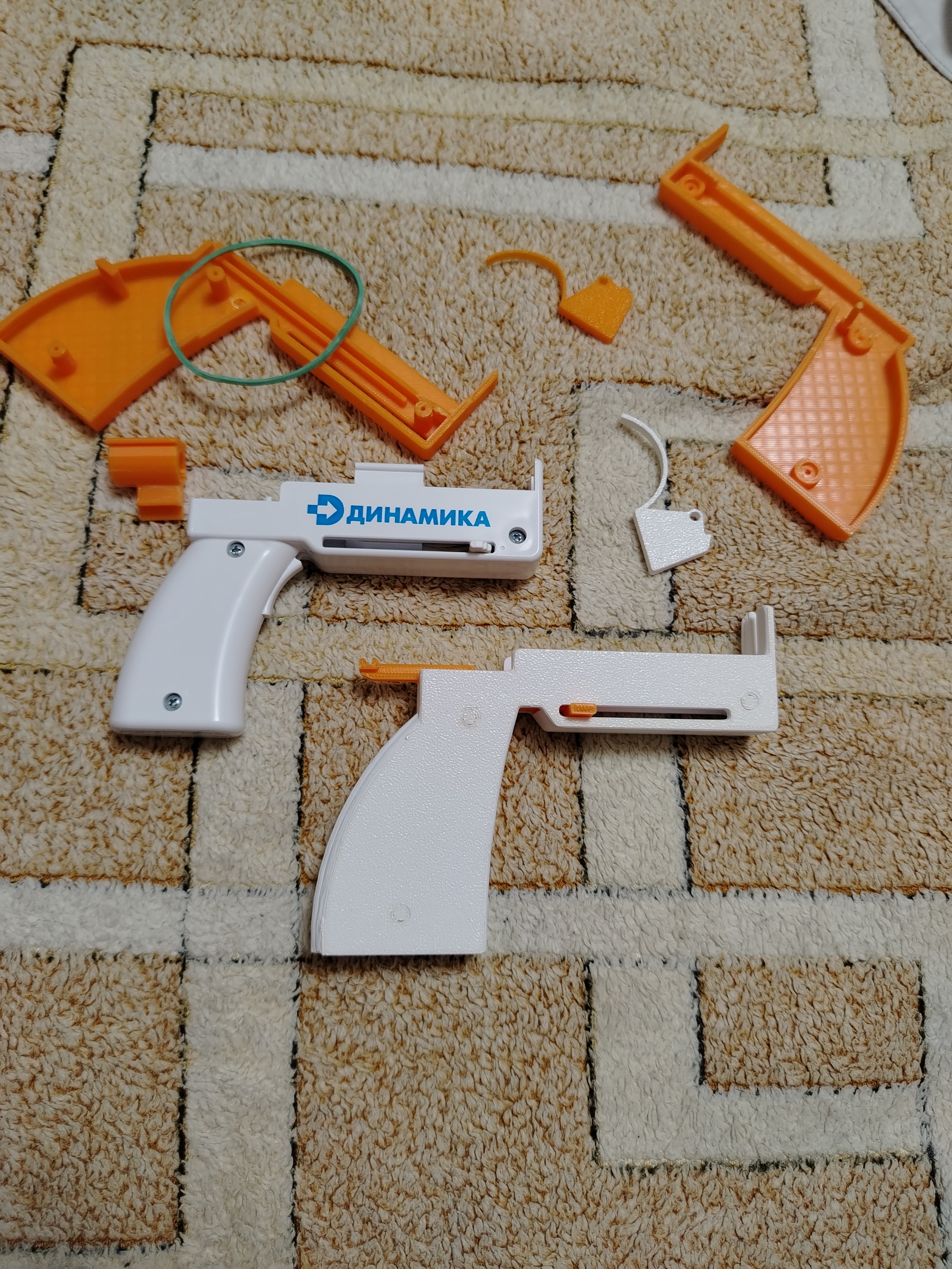 Injection gun with a syringe. Gun for injections at home. Makes an automatic sharp injection.