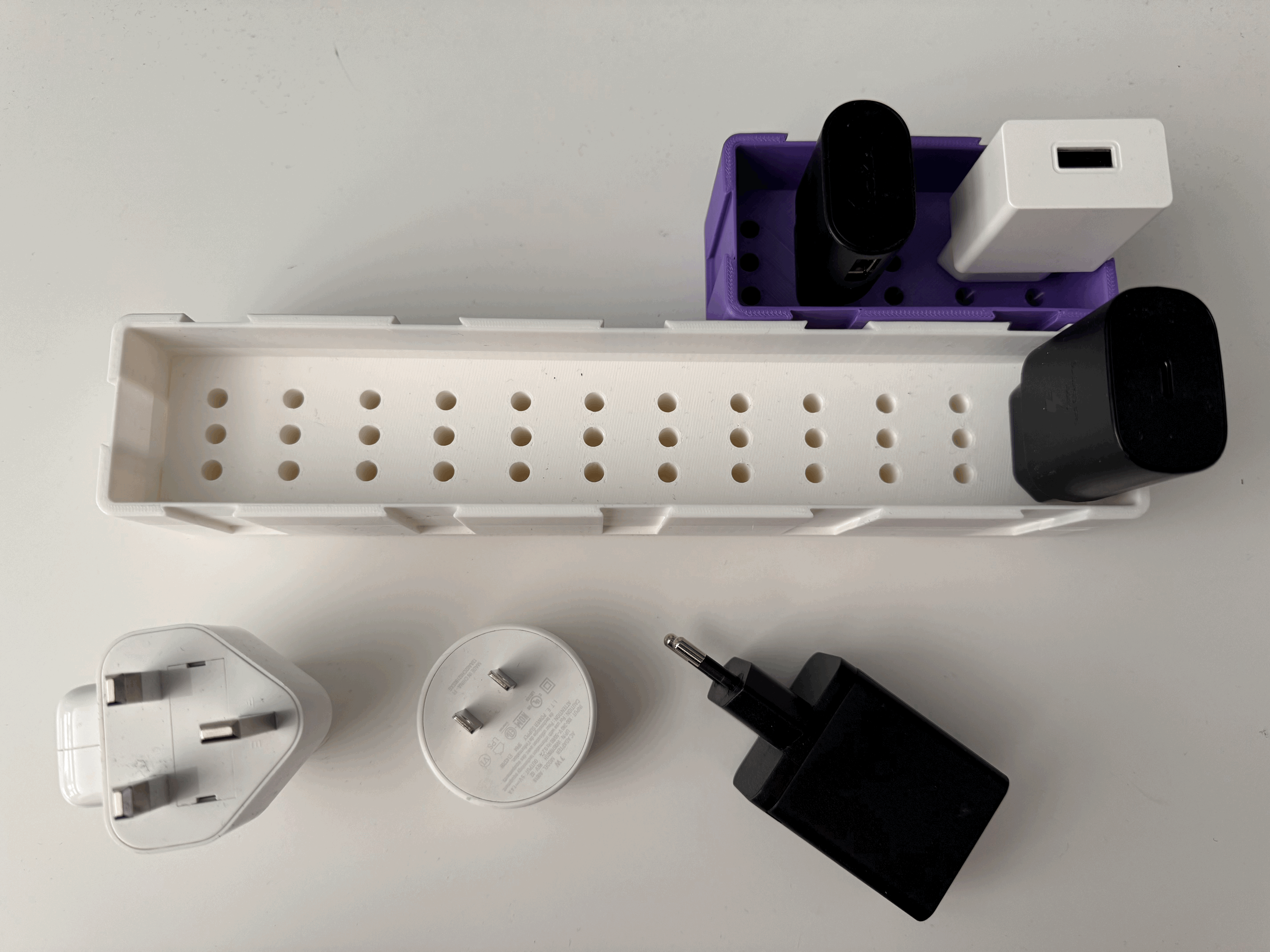 Catch all tray plug/charger holder (UK/USA/EU plugs)
