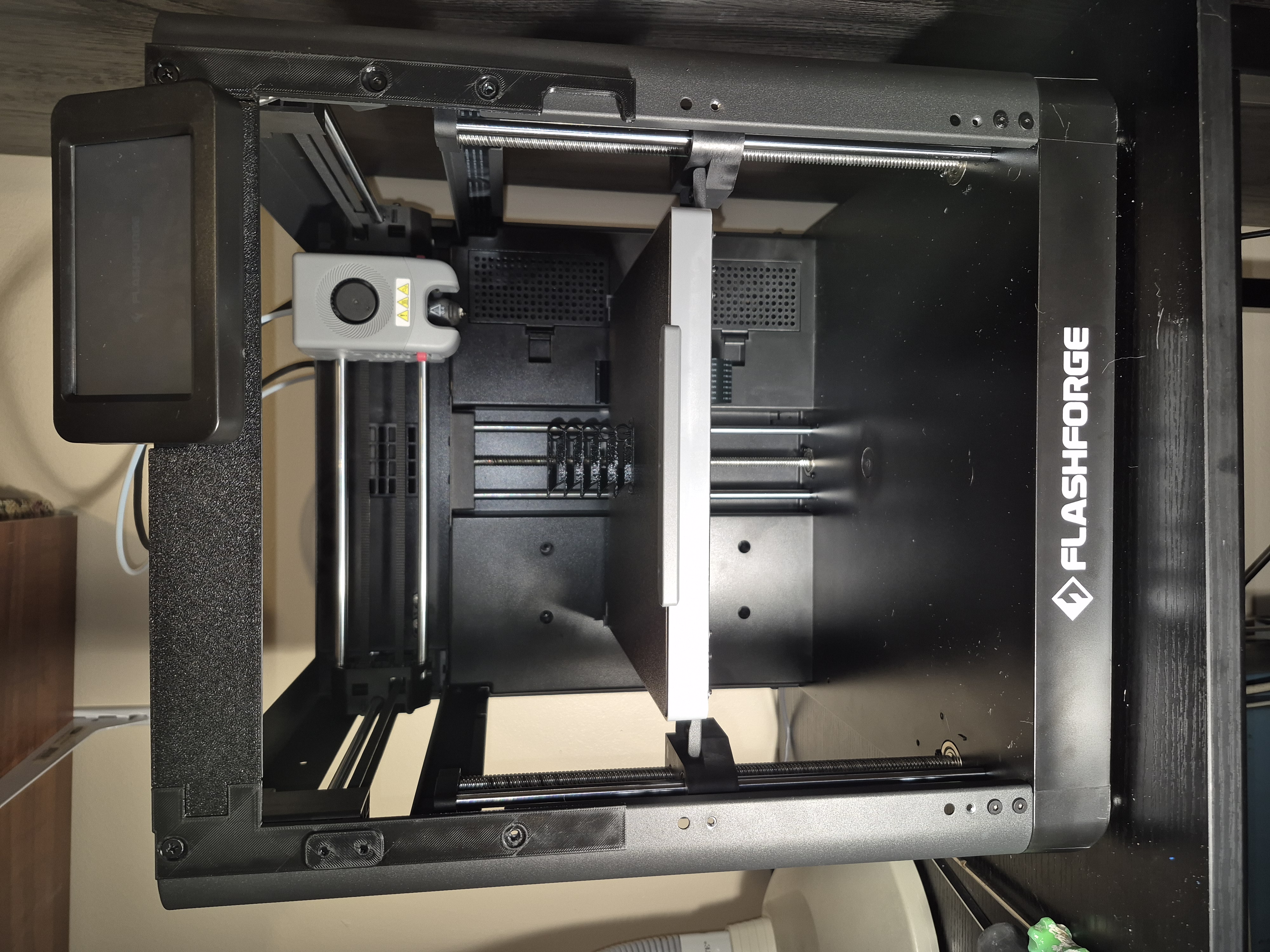 Full width front shield plate
