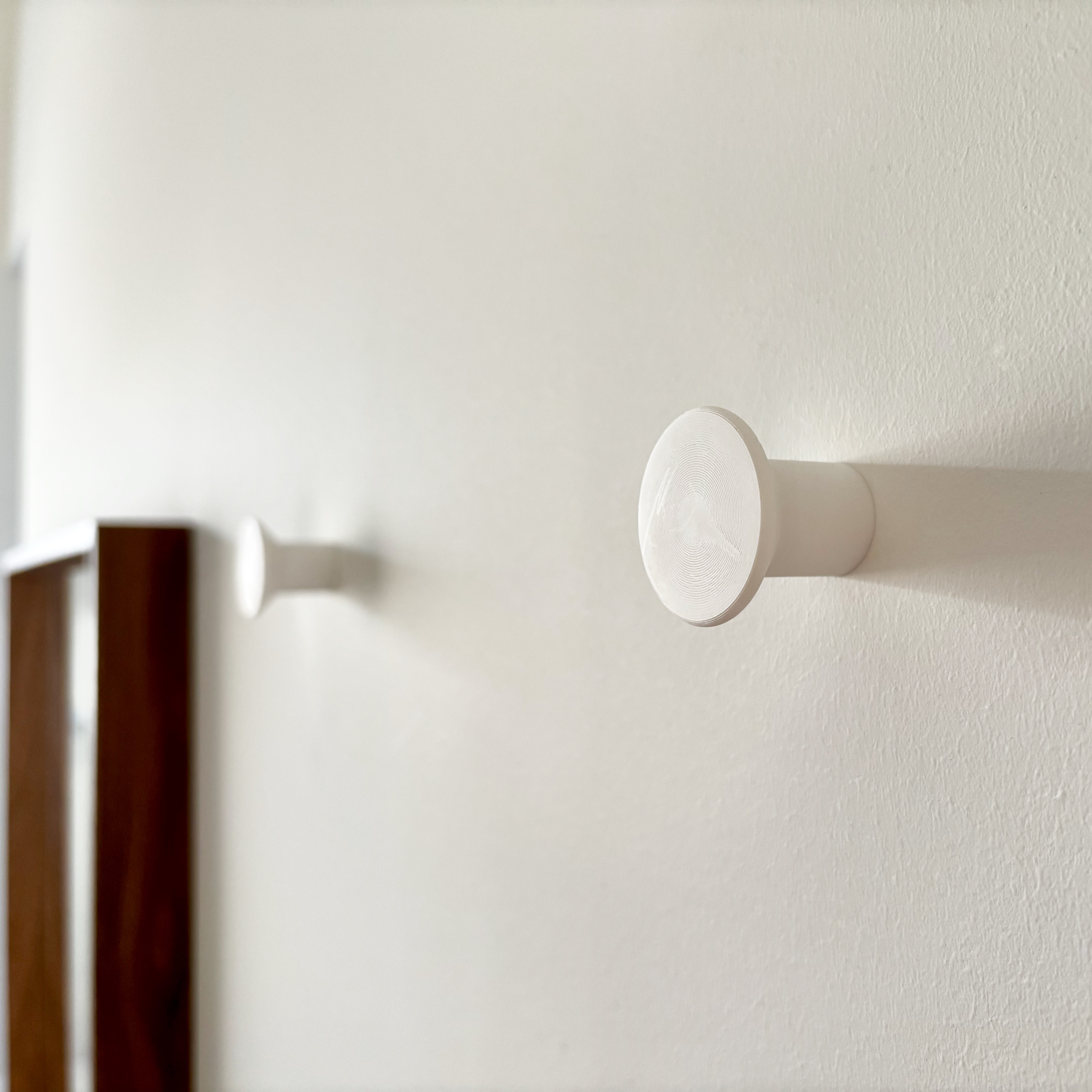 Elegant clothes knob with invisible mount