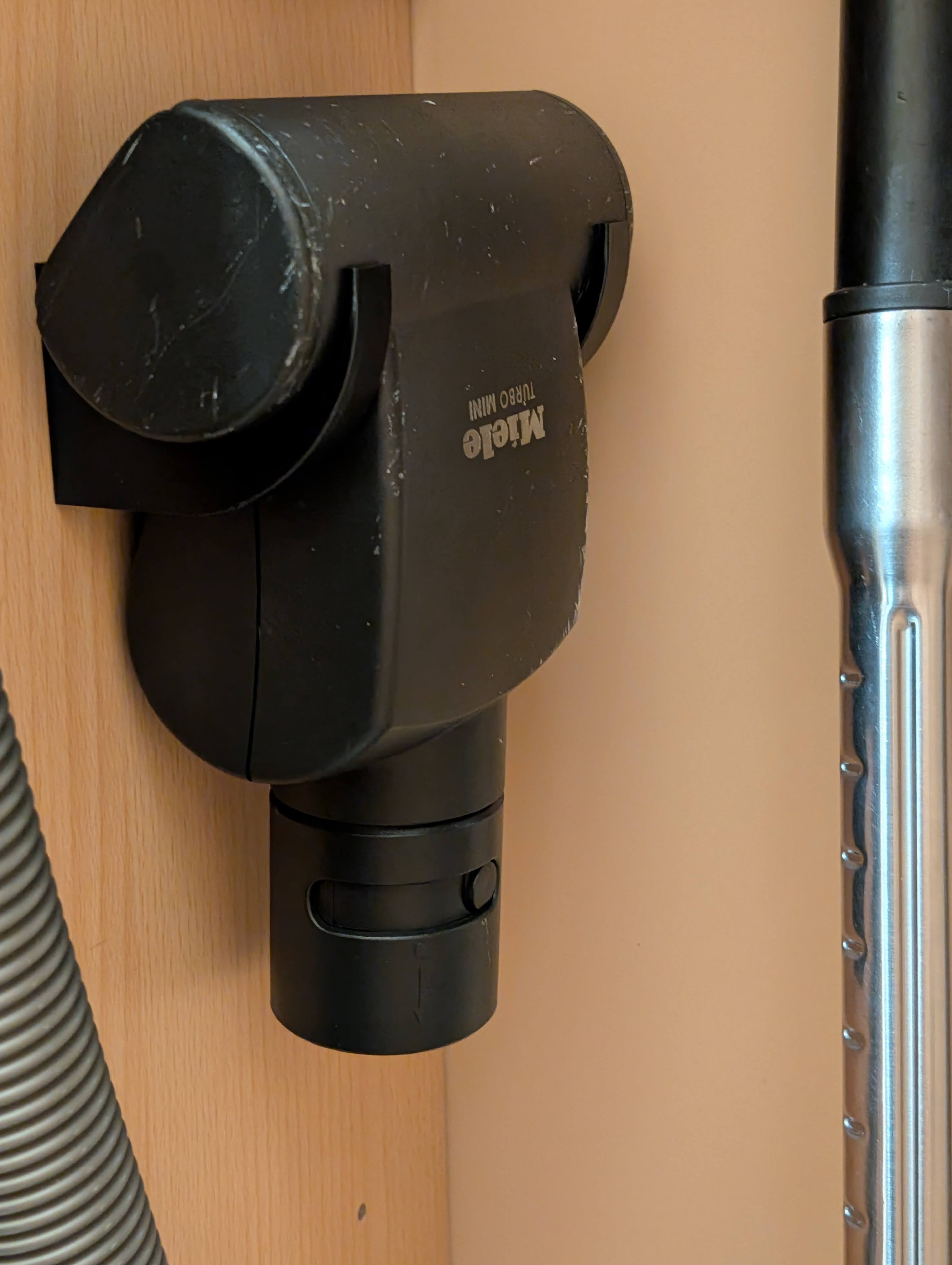Wall mount for Miele handheld turbo vacuum hose (STB 101)