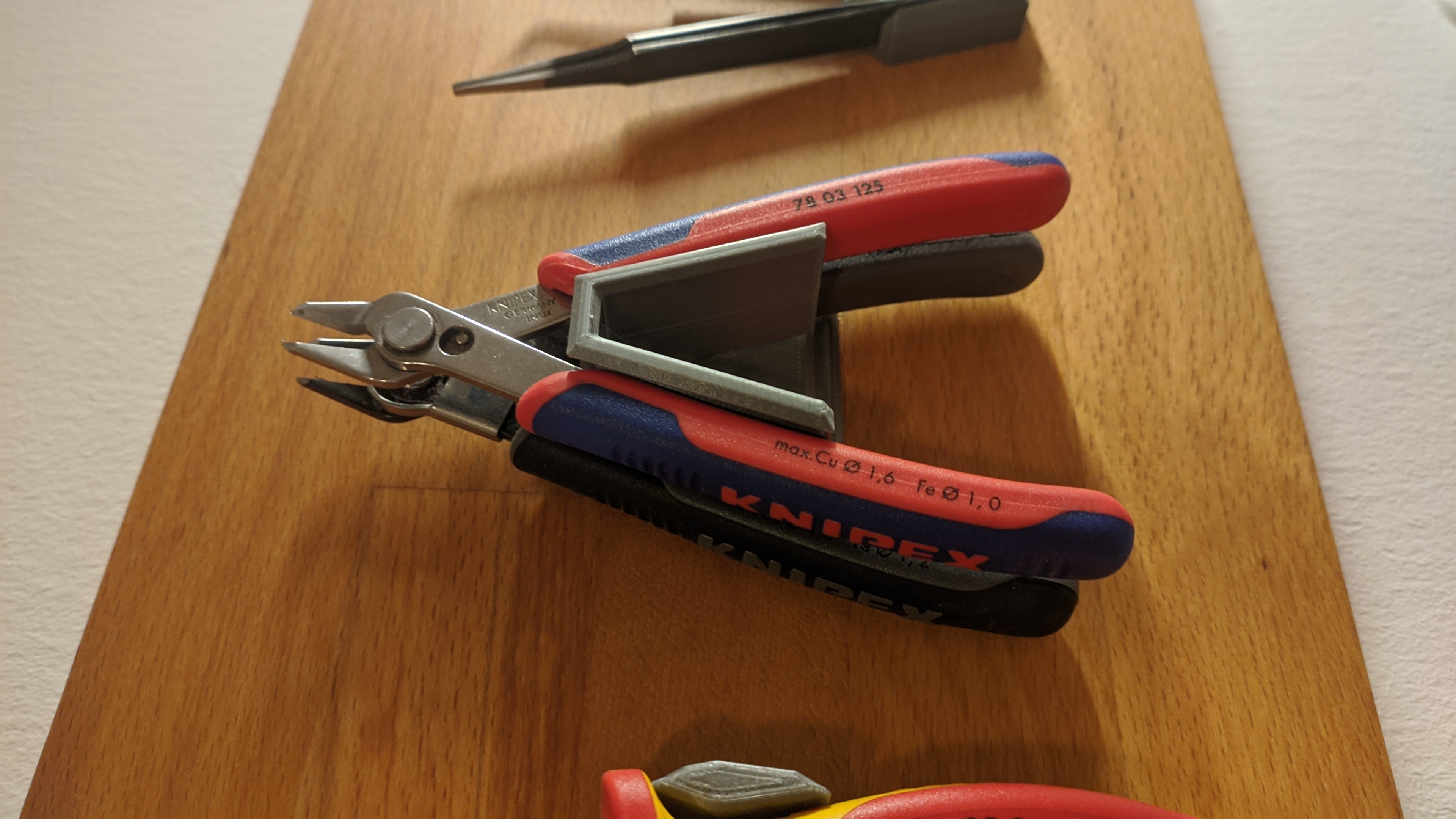 Knipex holder for two small cutters