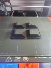 Table leg holder/stop