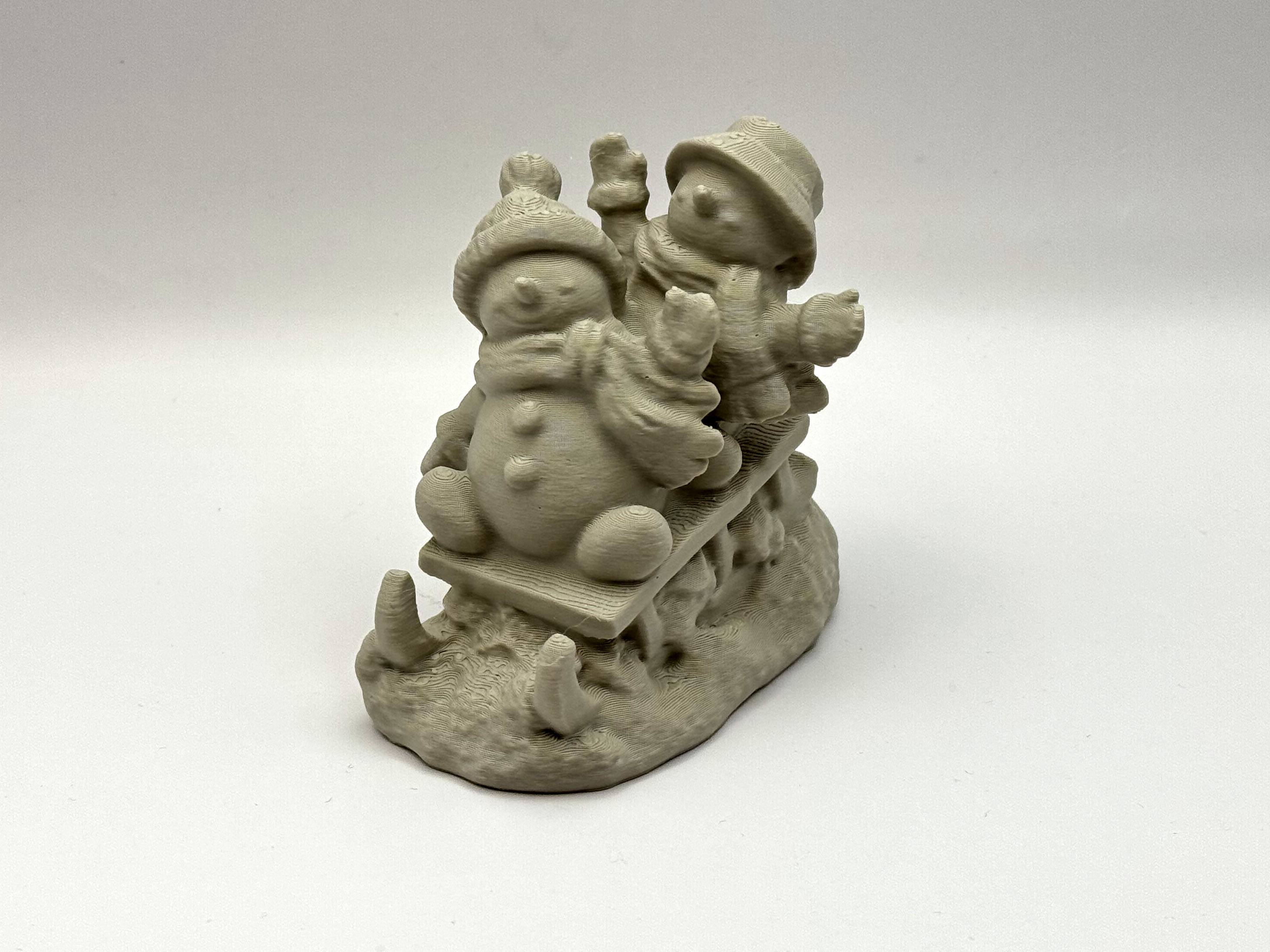 Snowman on Sled