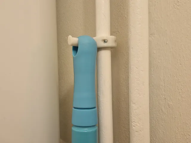 broom holder for pipe