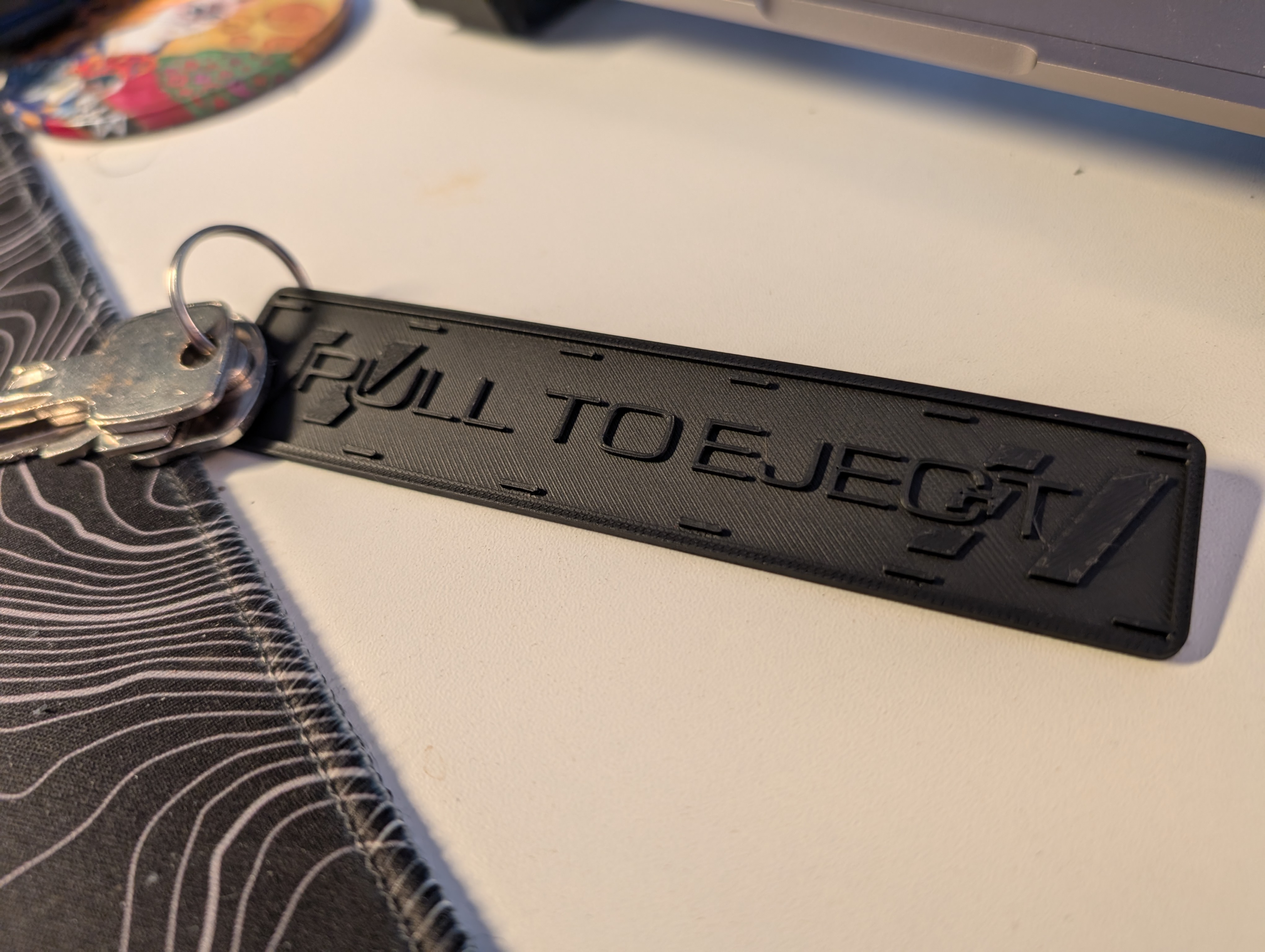 Pull to Eject Keychain — thumbnail 2