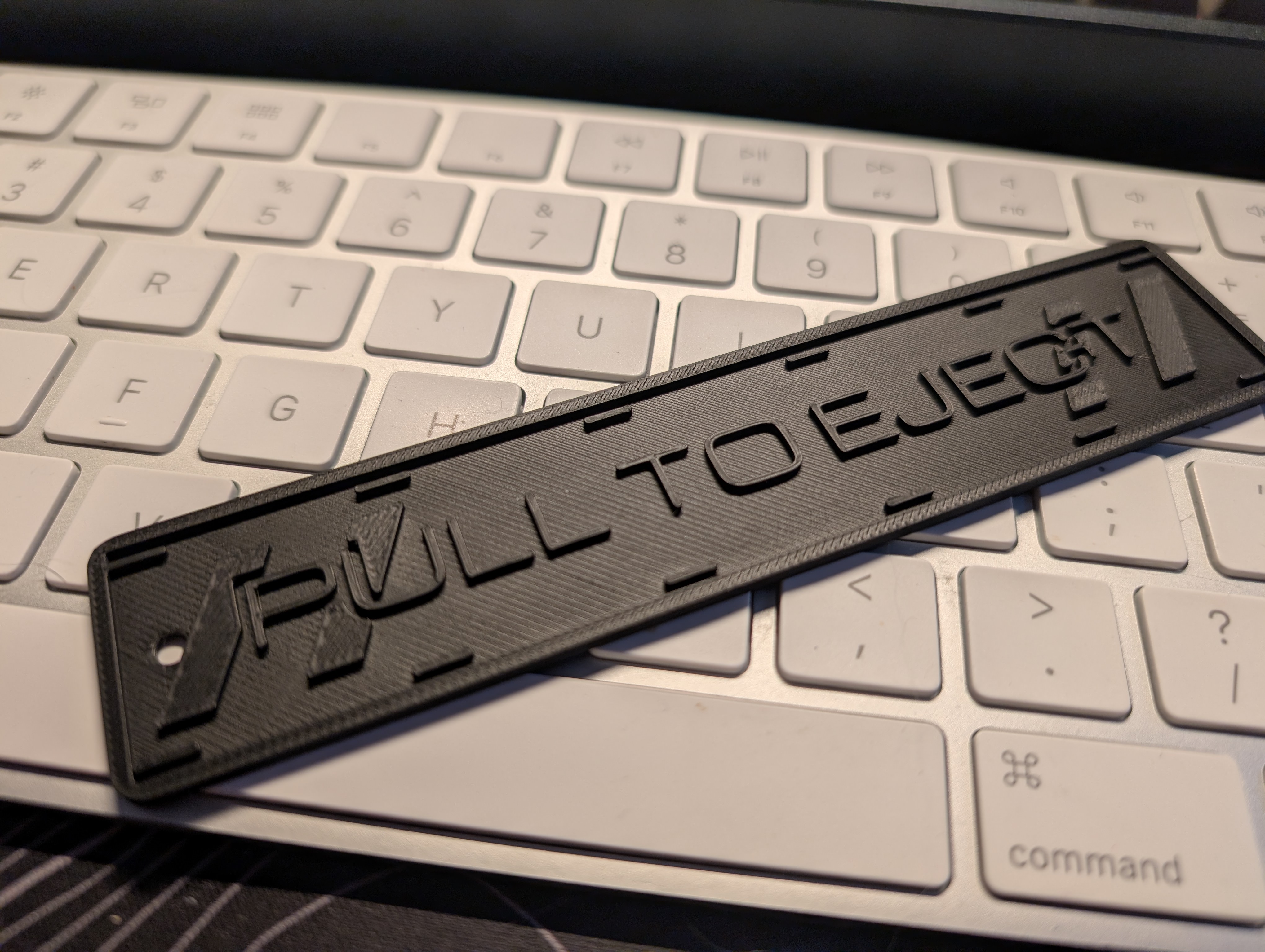 Pull to Eject Keychain — thumbnail 3