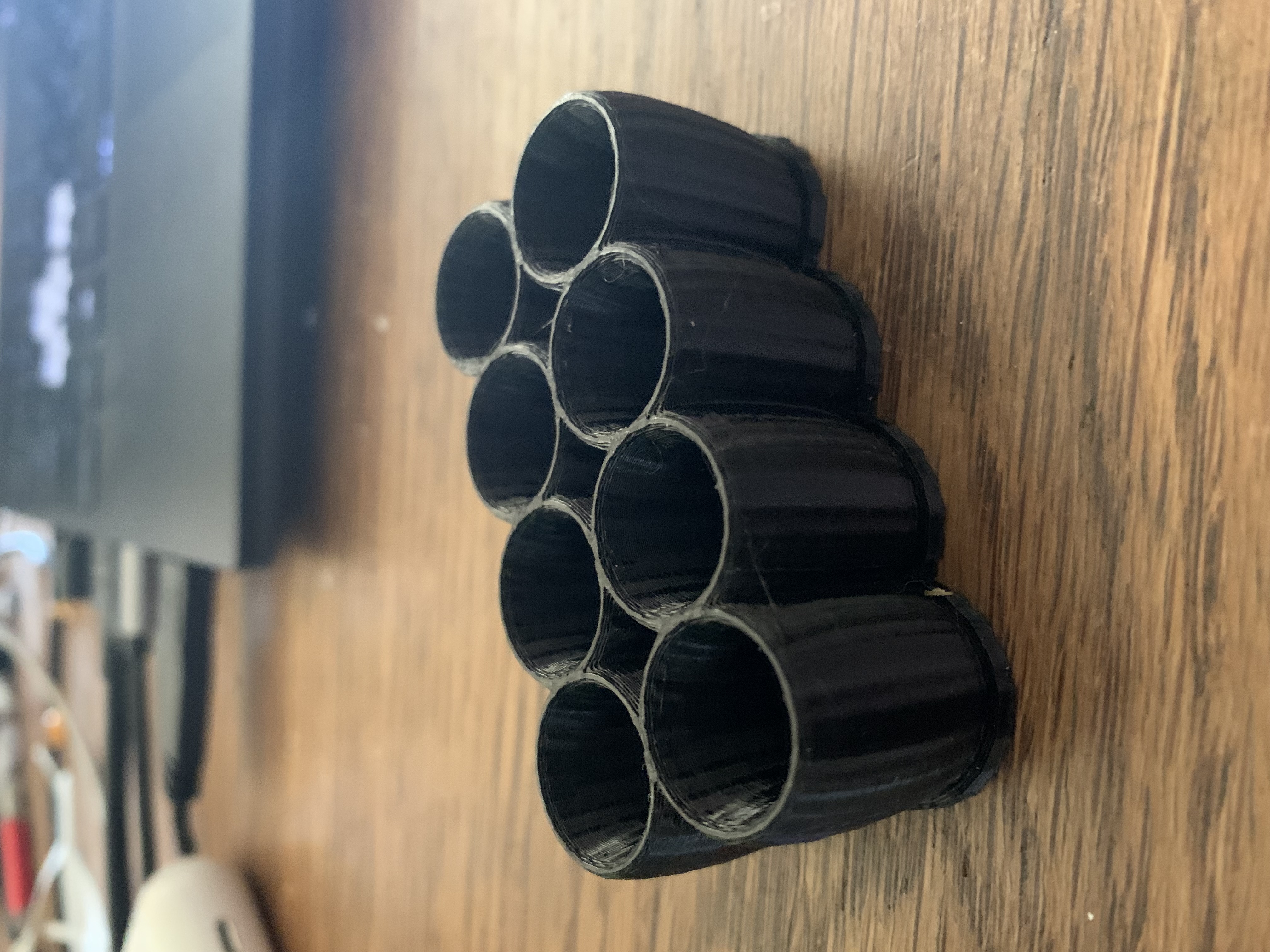 Battery stand for herbal inhaler cartridges