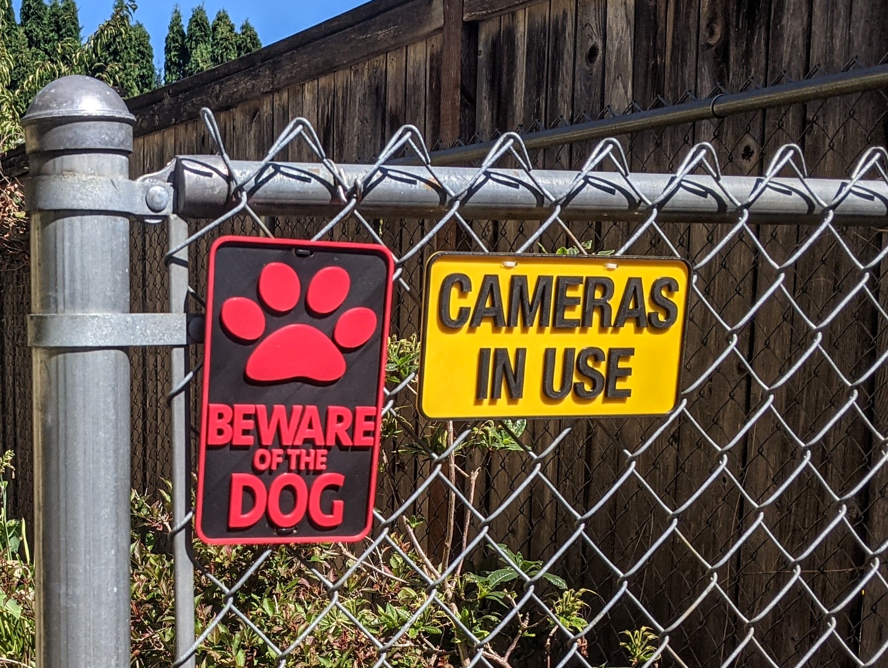 BEWARE OF THE DOG sign.