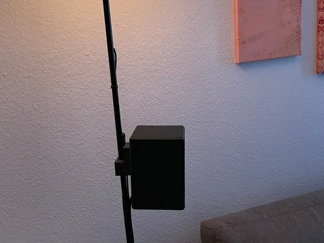 Mount for wireless rear speakers to standing lamp