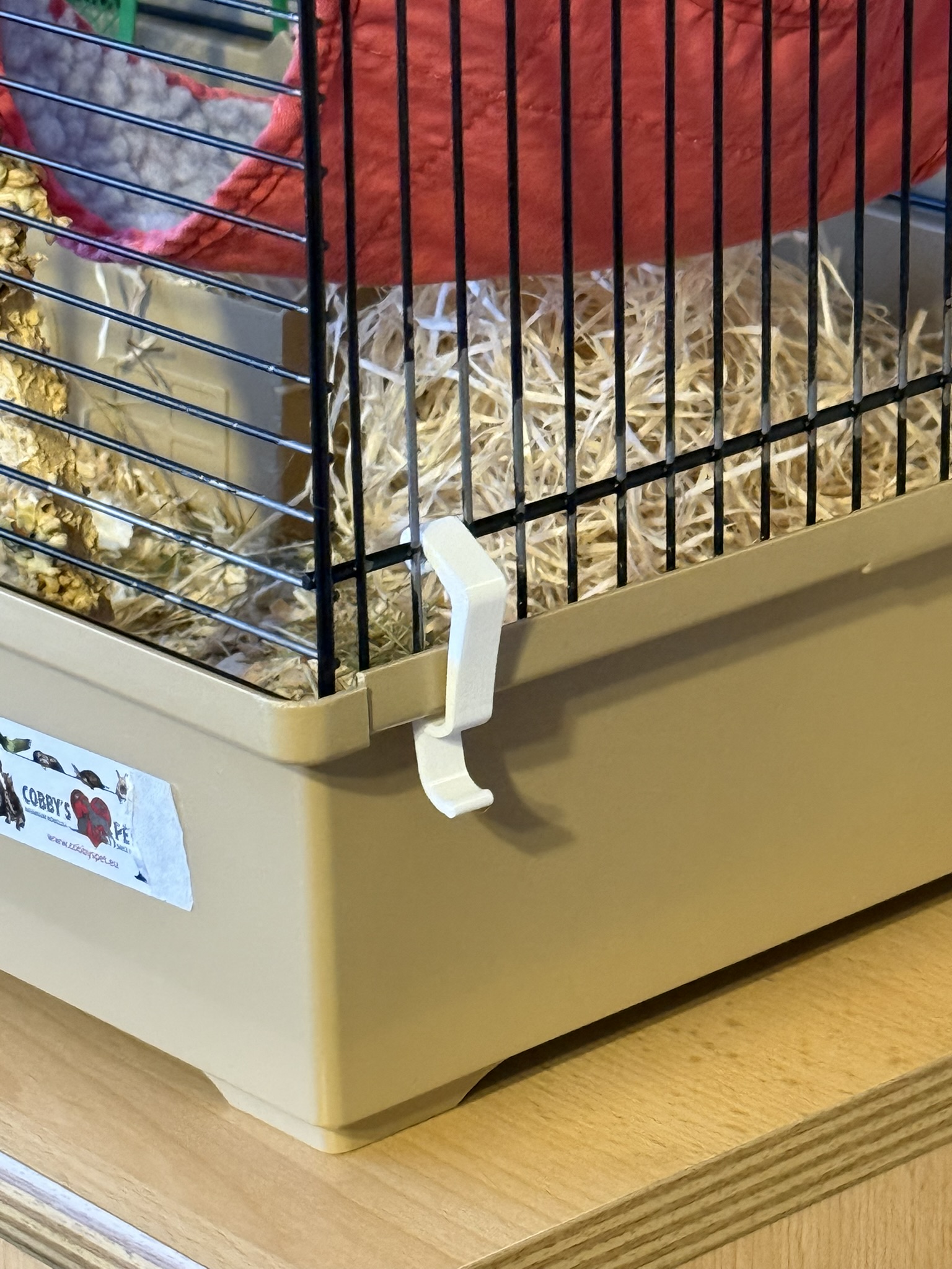 Hook for a hamster cage