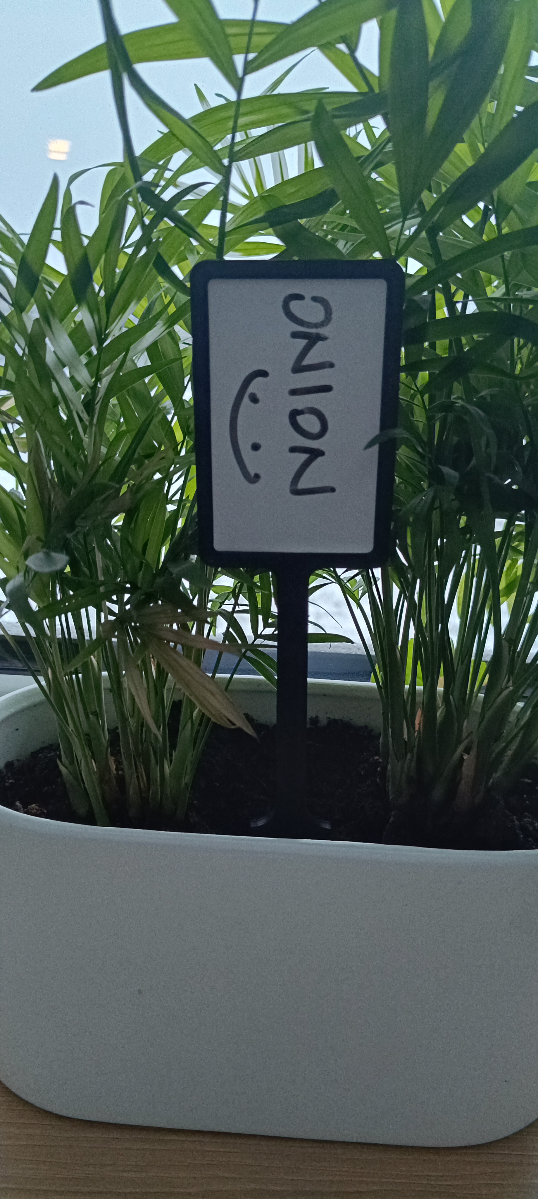 Stand with a label for plants