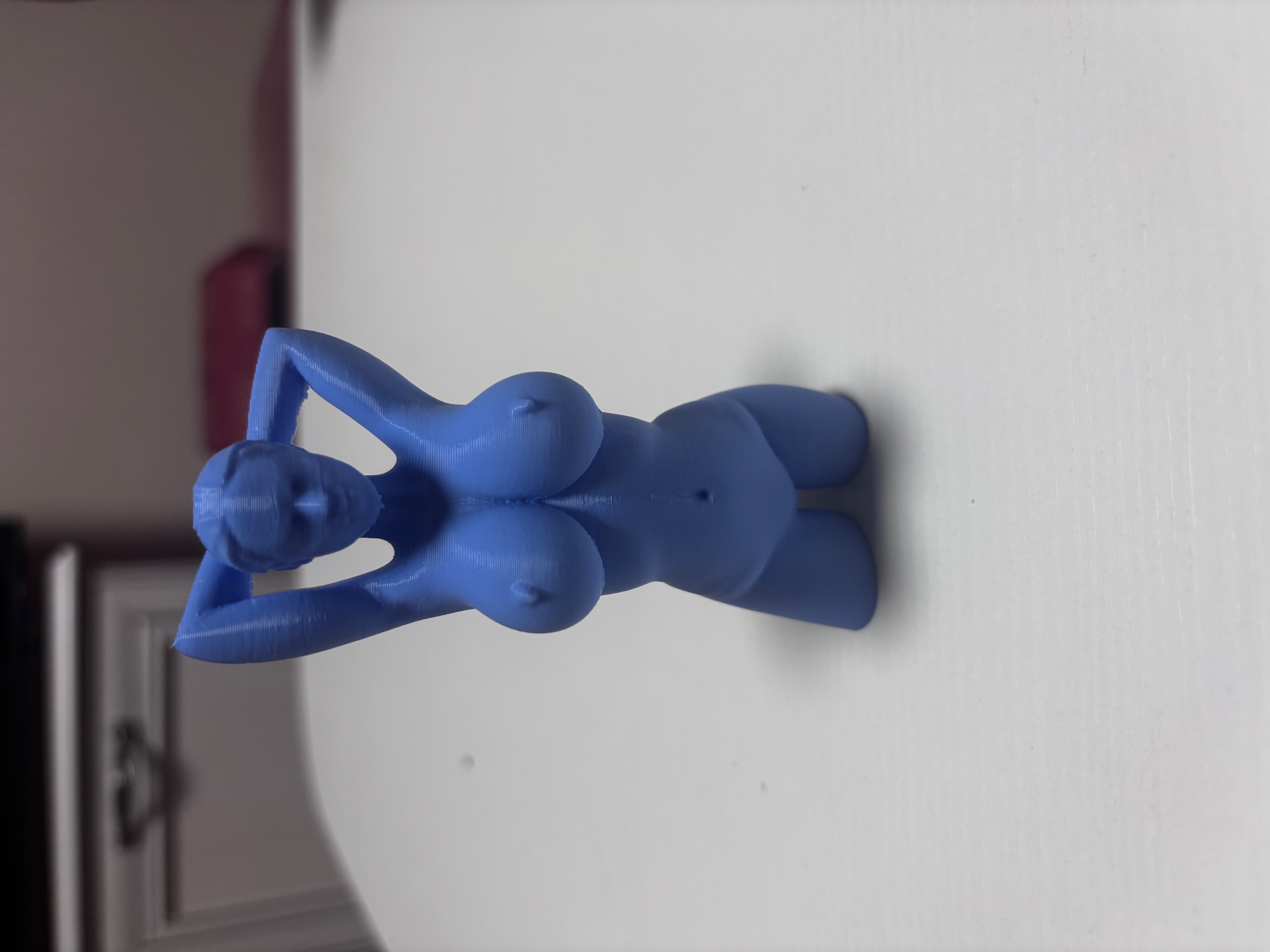 Sexy sculpture of a lady with beautiful breasts