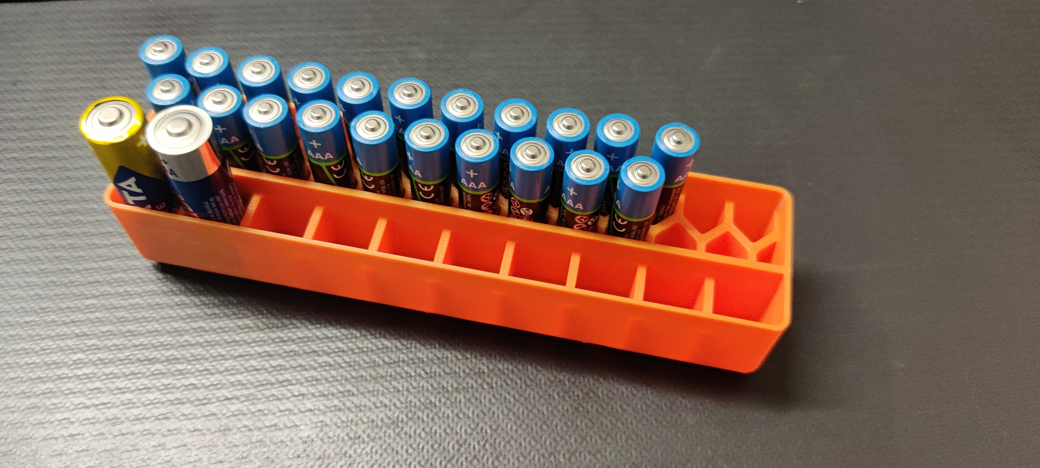 26 AAA / 10 AA Battery holder in a Gridfinity bin