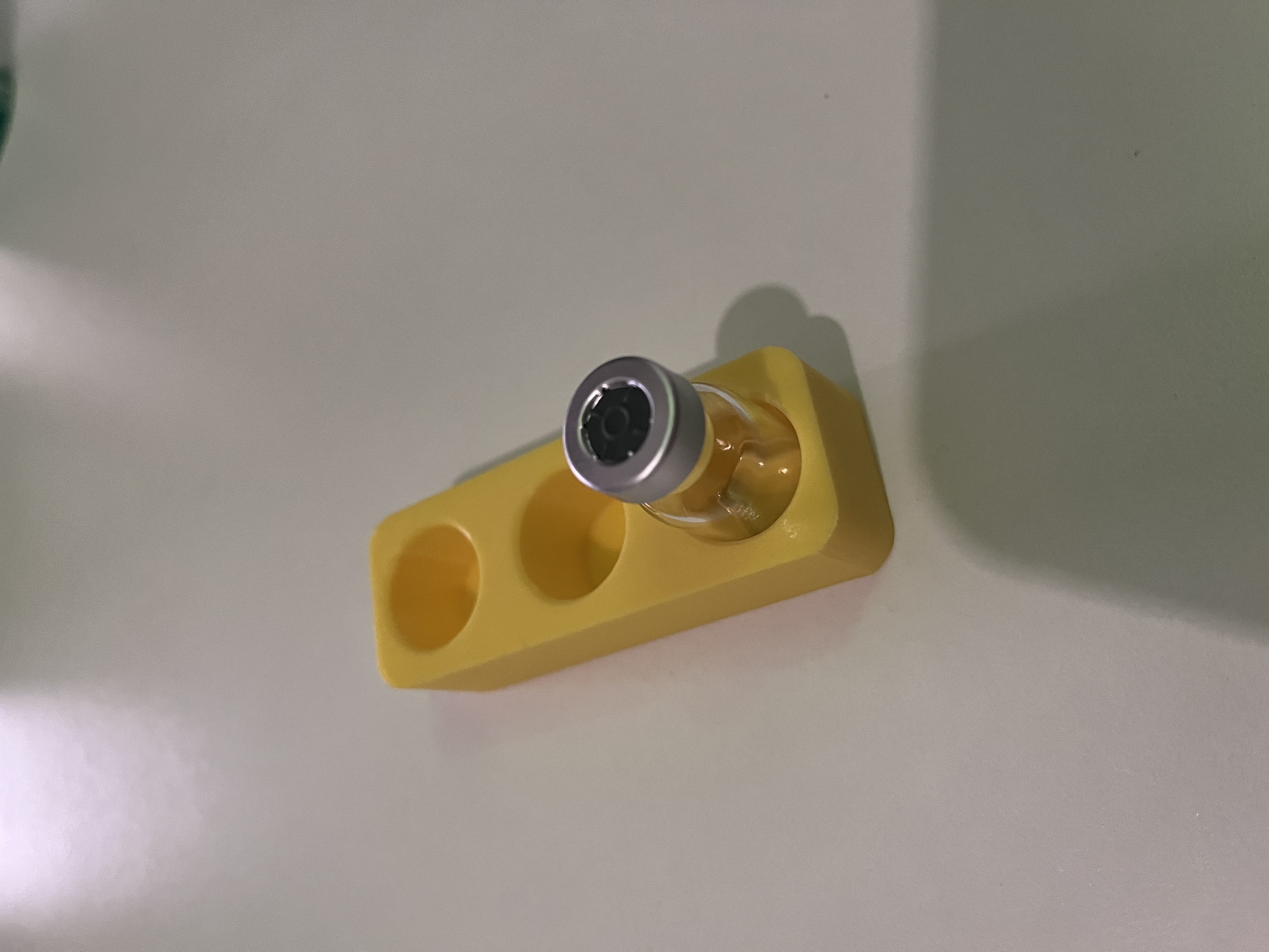 Three vial holder
