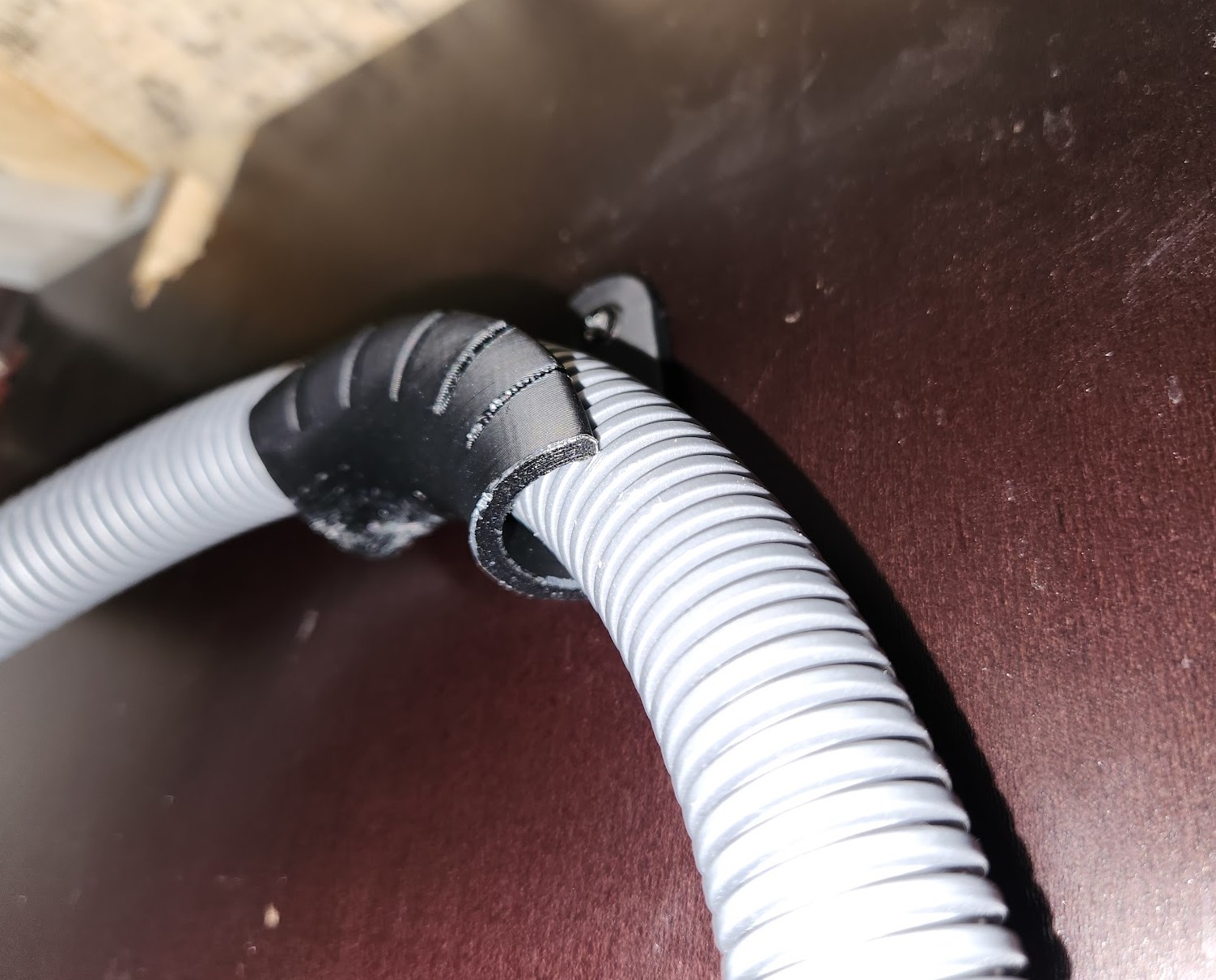 Dishwasher Hose Support Bracket