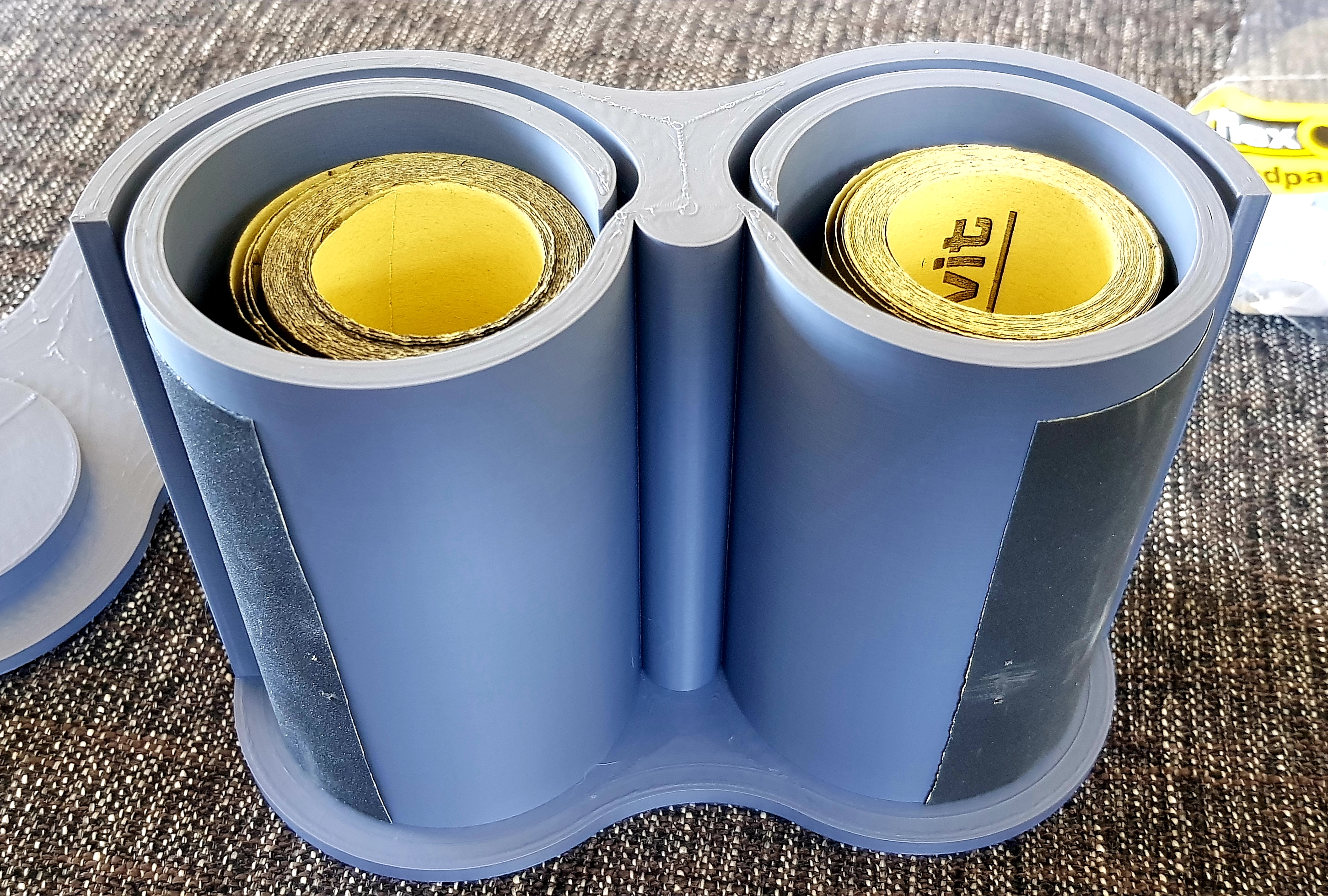 Sandpaper roll holder and dispenser