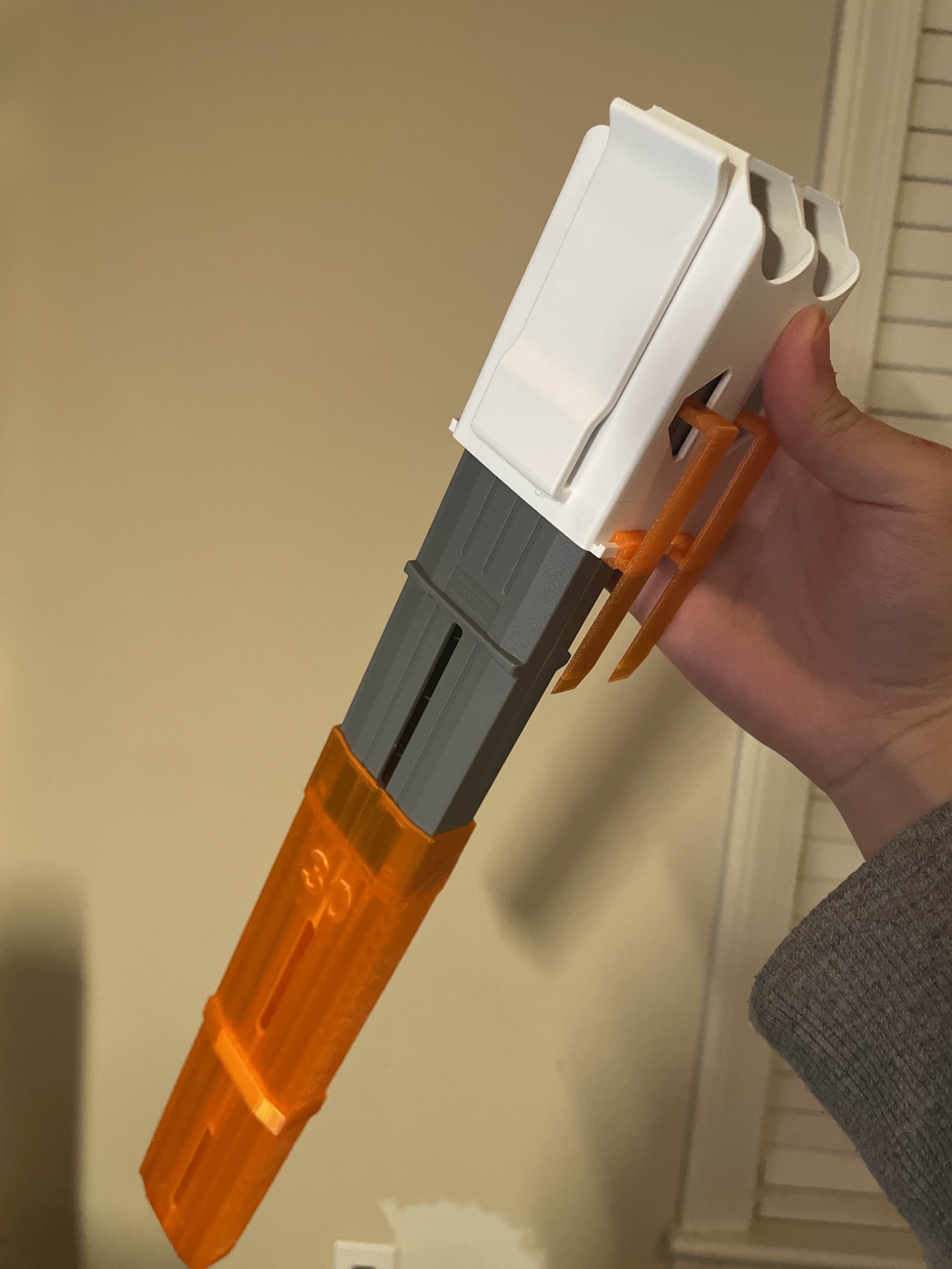 Dart Zone or Talon mag holder with paddle release