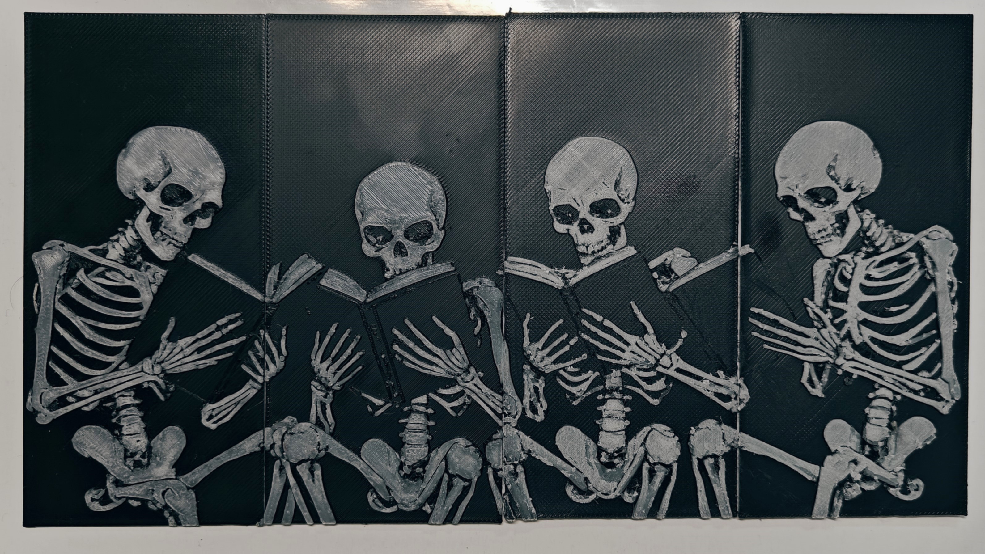 Bookmark: Skeletons reading books