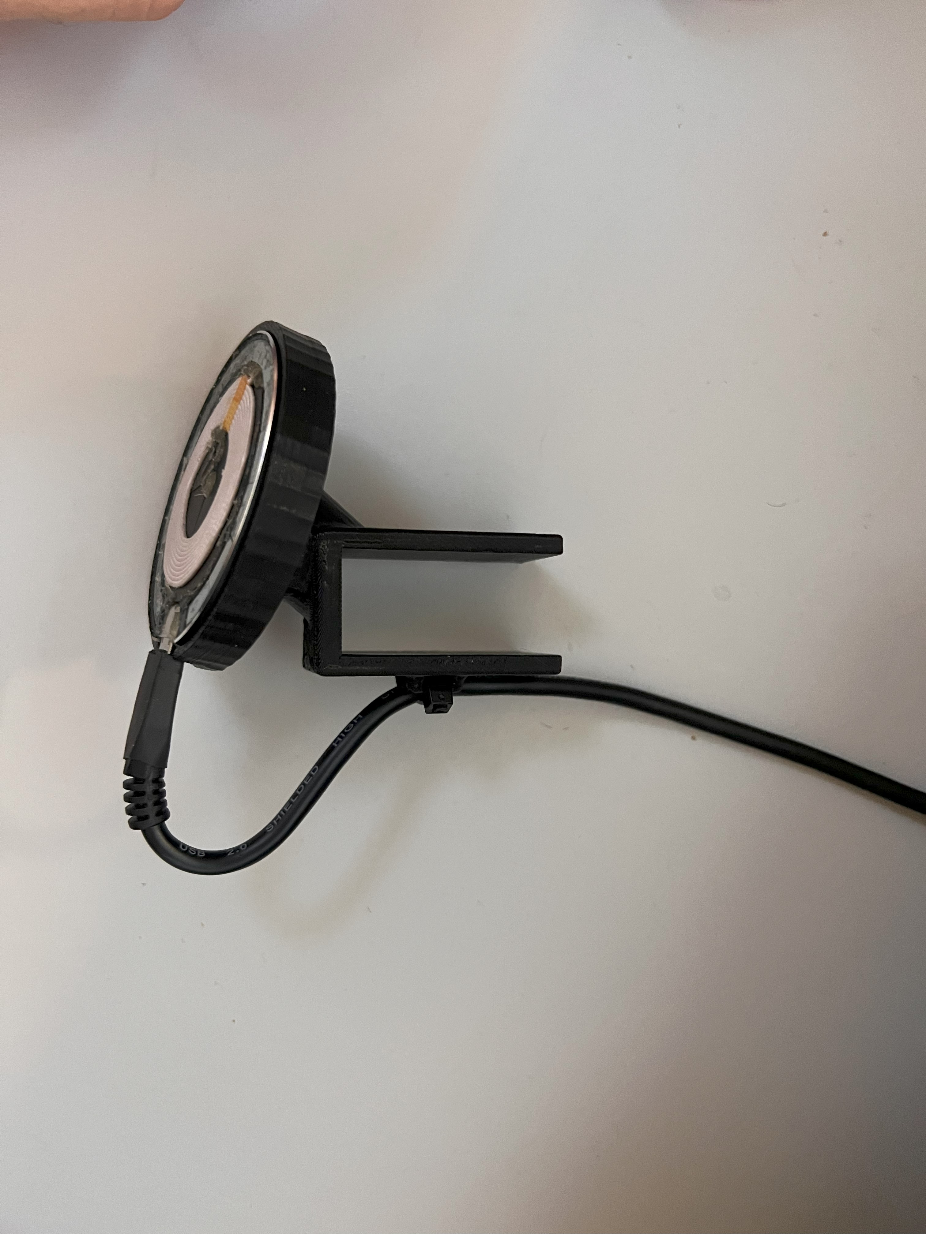 Holder for wireless magnetic charger