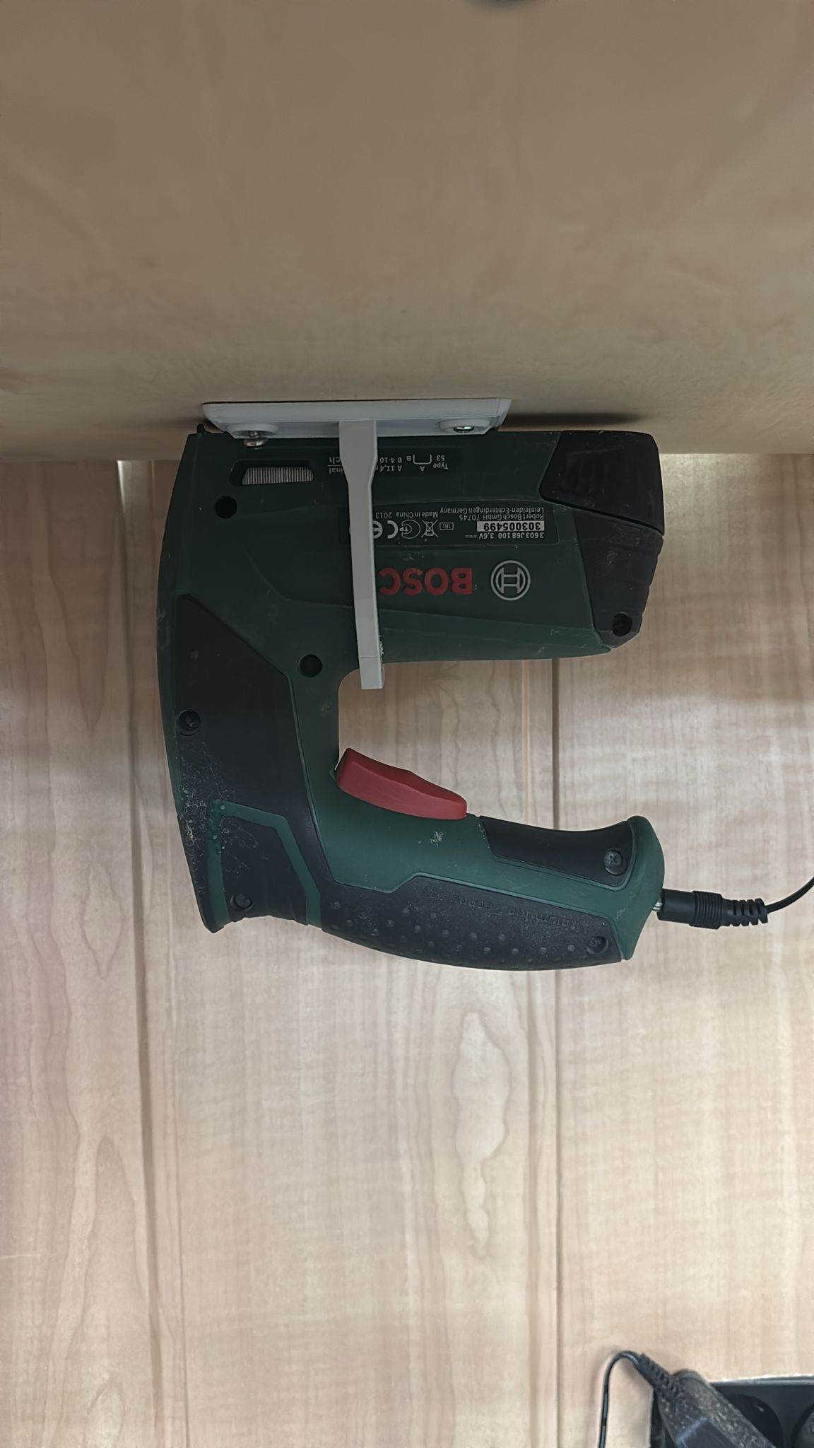 Mounting holder for Bosch battery tacker PTK 3.6Li