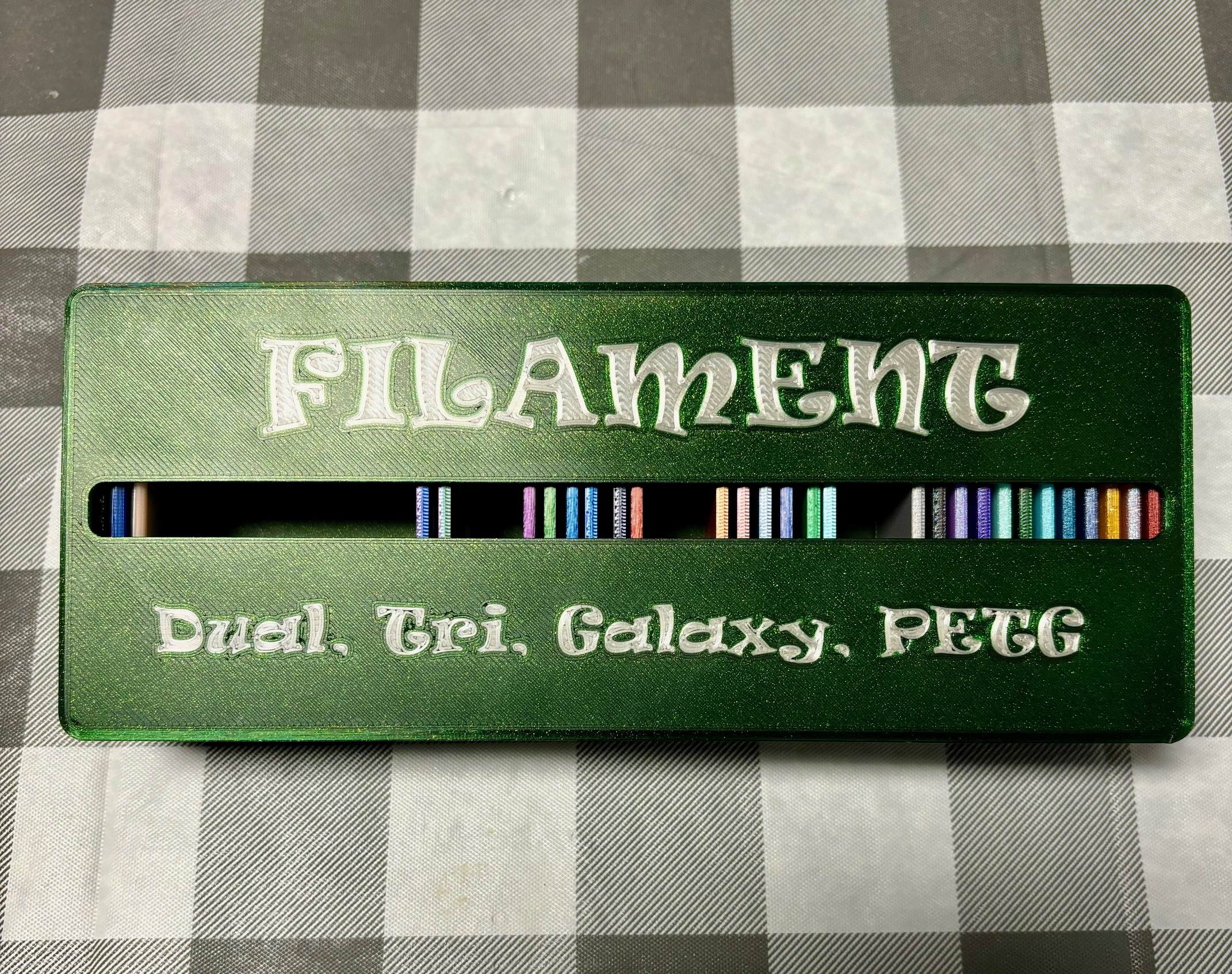 Remix of PLA Filament Box Top with embedded lettering for PLA and other filaments.