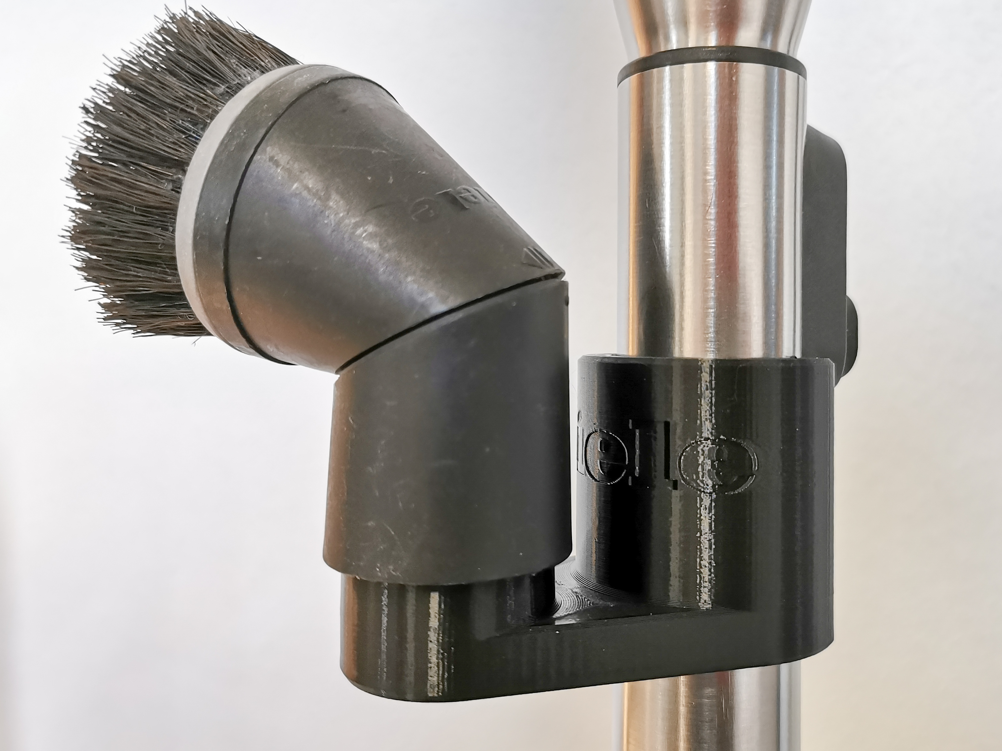 Brush clip for 35 mm vacuum cleaner telescopic tube (e.g. Miele)