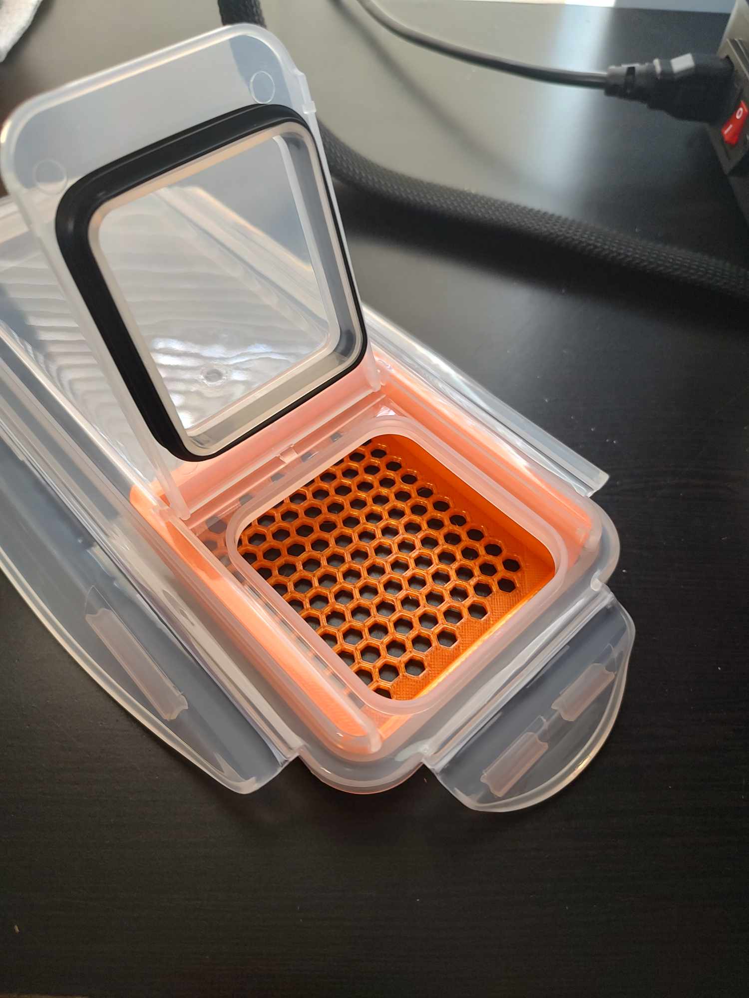 Cereal Container Under-Lid Desiccant Box with Honeycomb bottom.