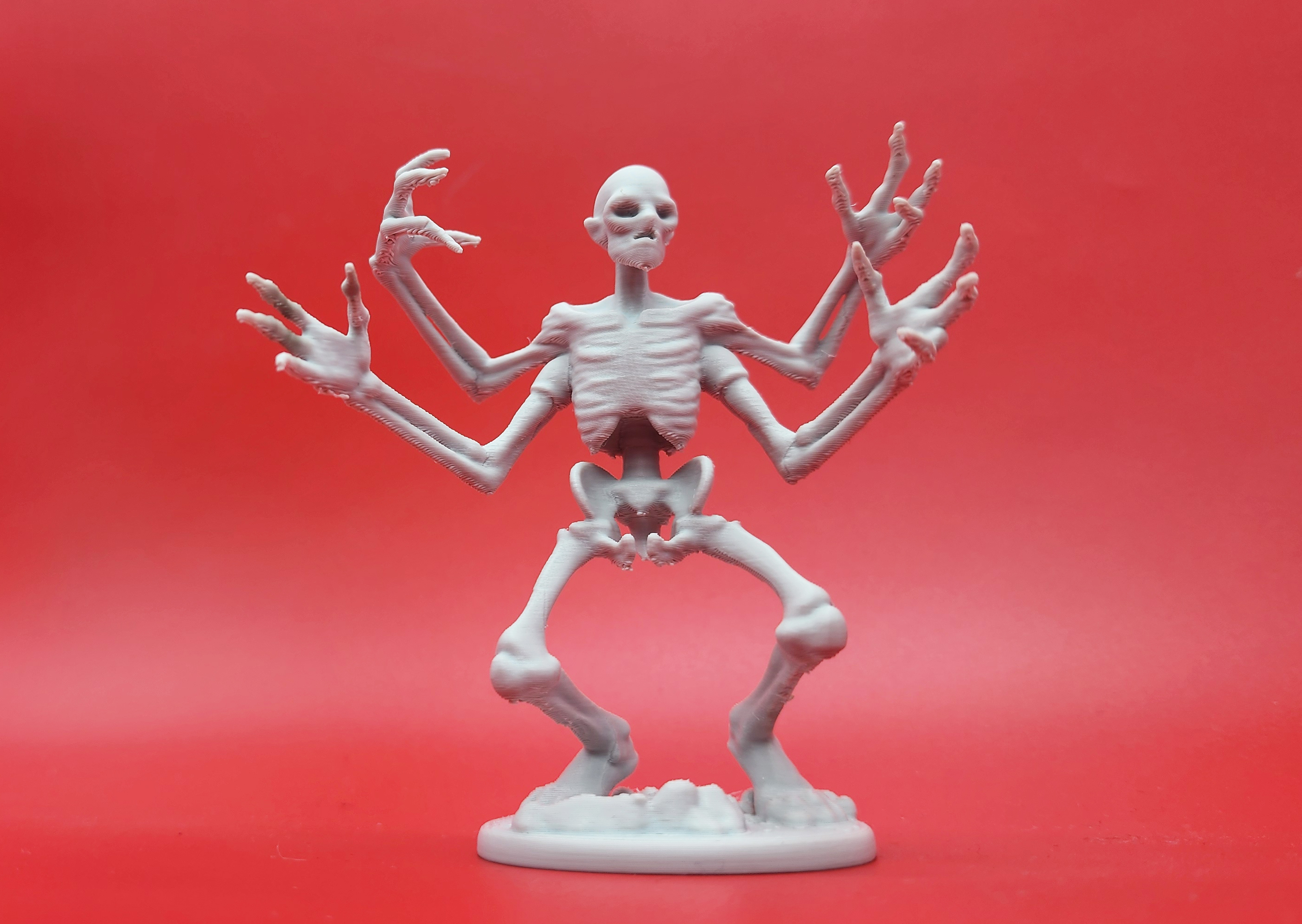 Four-Armed Skeleton Figure