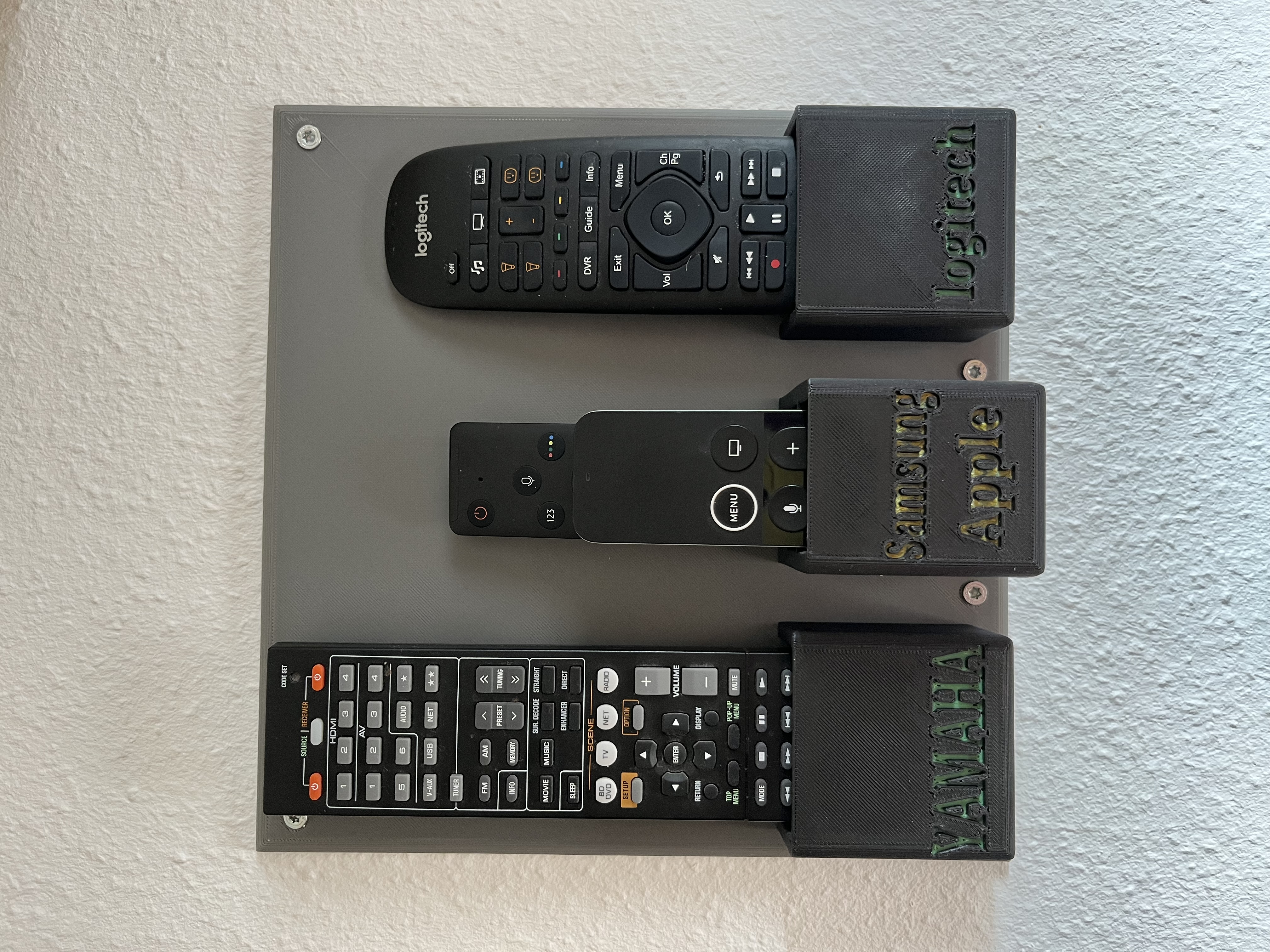 Wall mount for 4 remote controllers