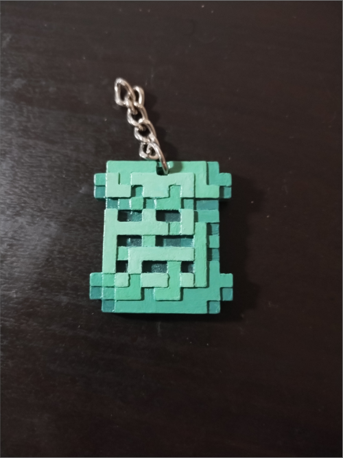 Emerald Tablet Keychain from Noita