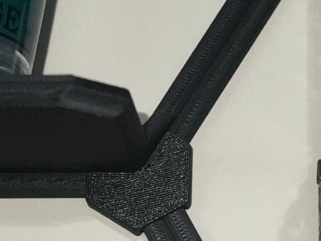 Connector for Shelved Sections of Wall Display Shelf