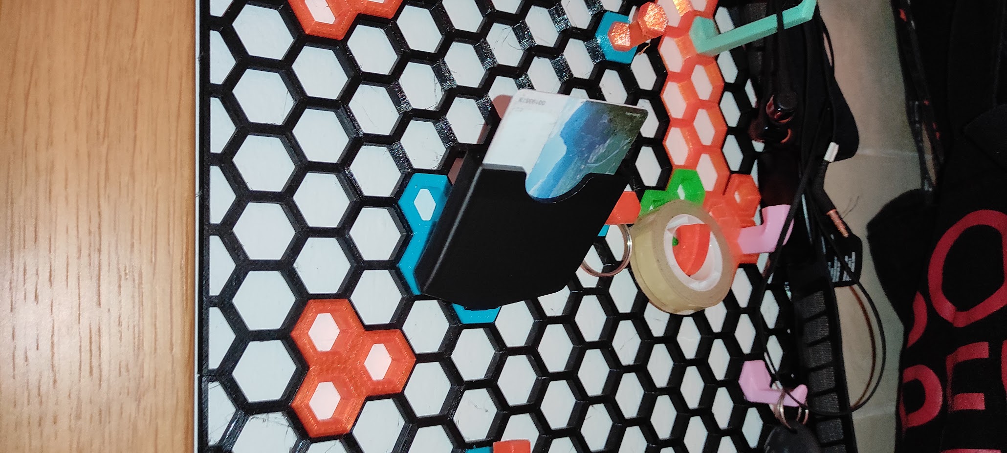 Credit card holder for honeycomb grid