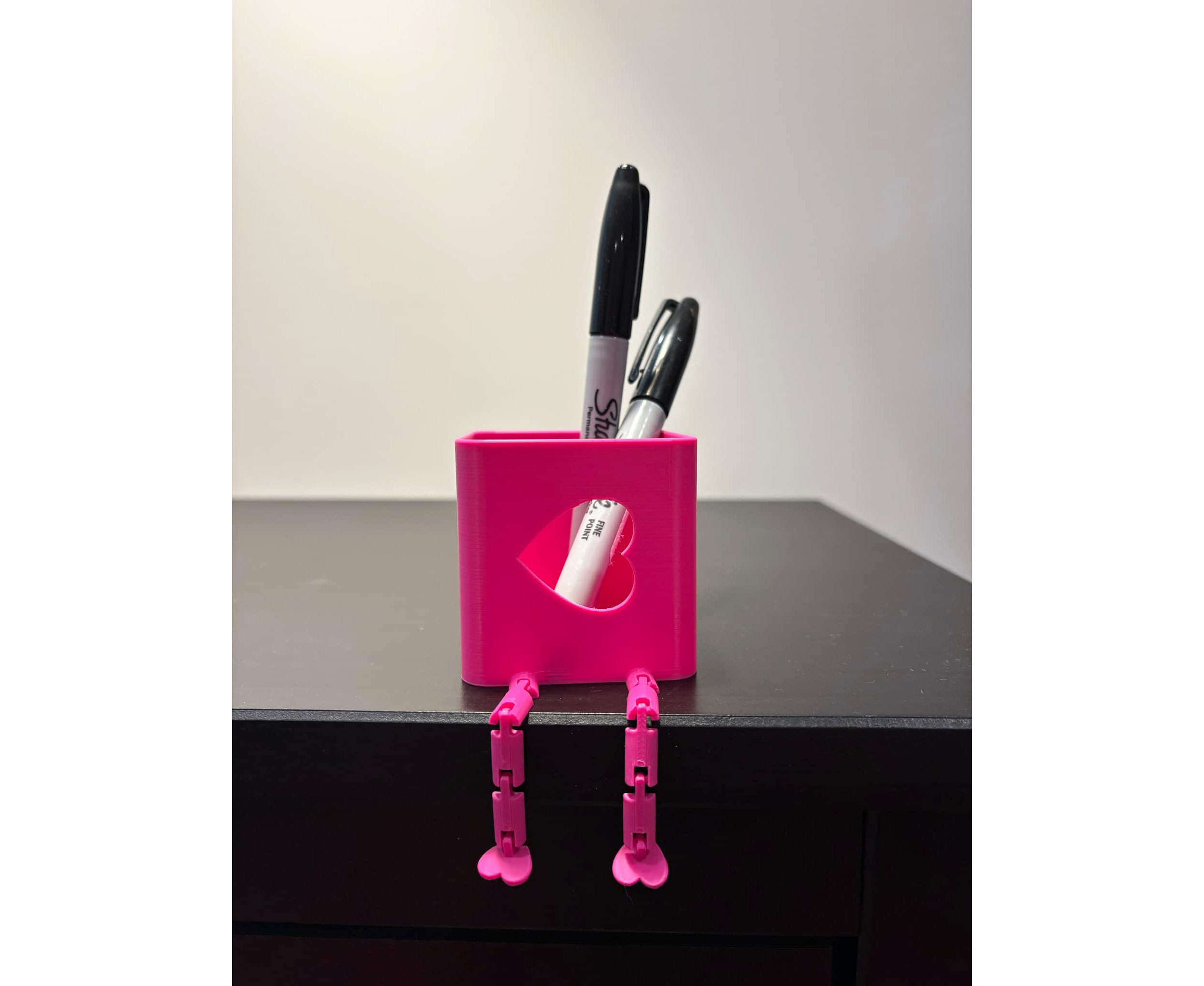 Valentine's day heart pencil holder with articulated legs