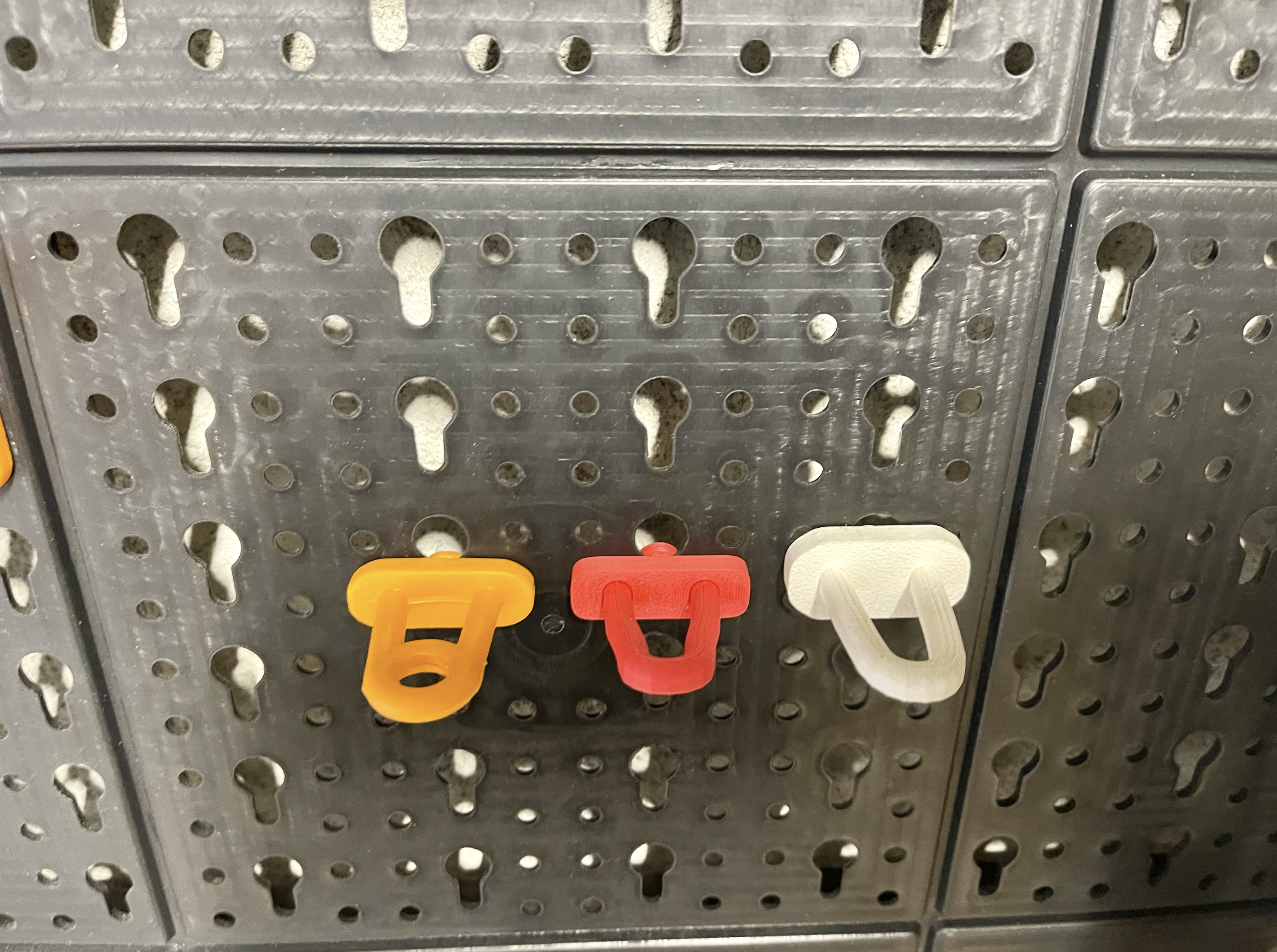Pegboard hooks perforated tool panel keyhole-shaped slots