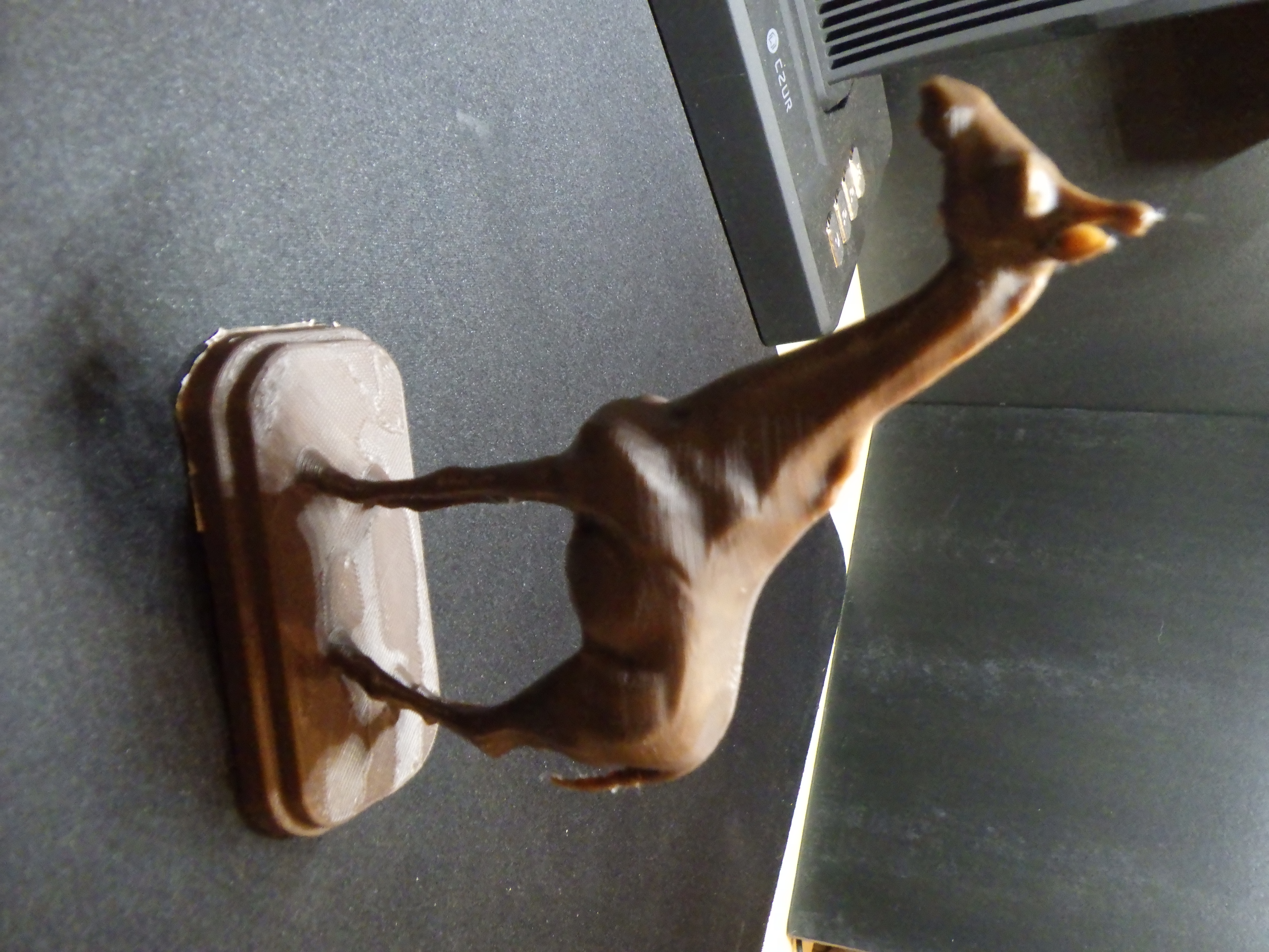 Giraffe Sculpture on a pedestal