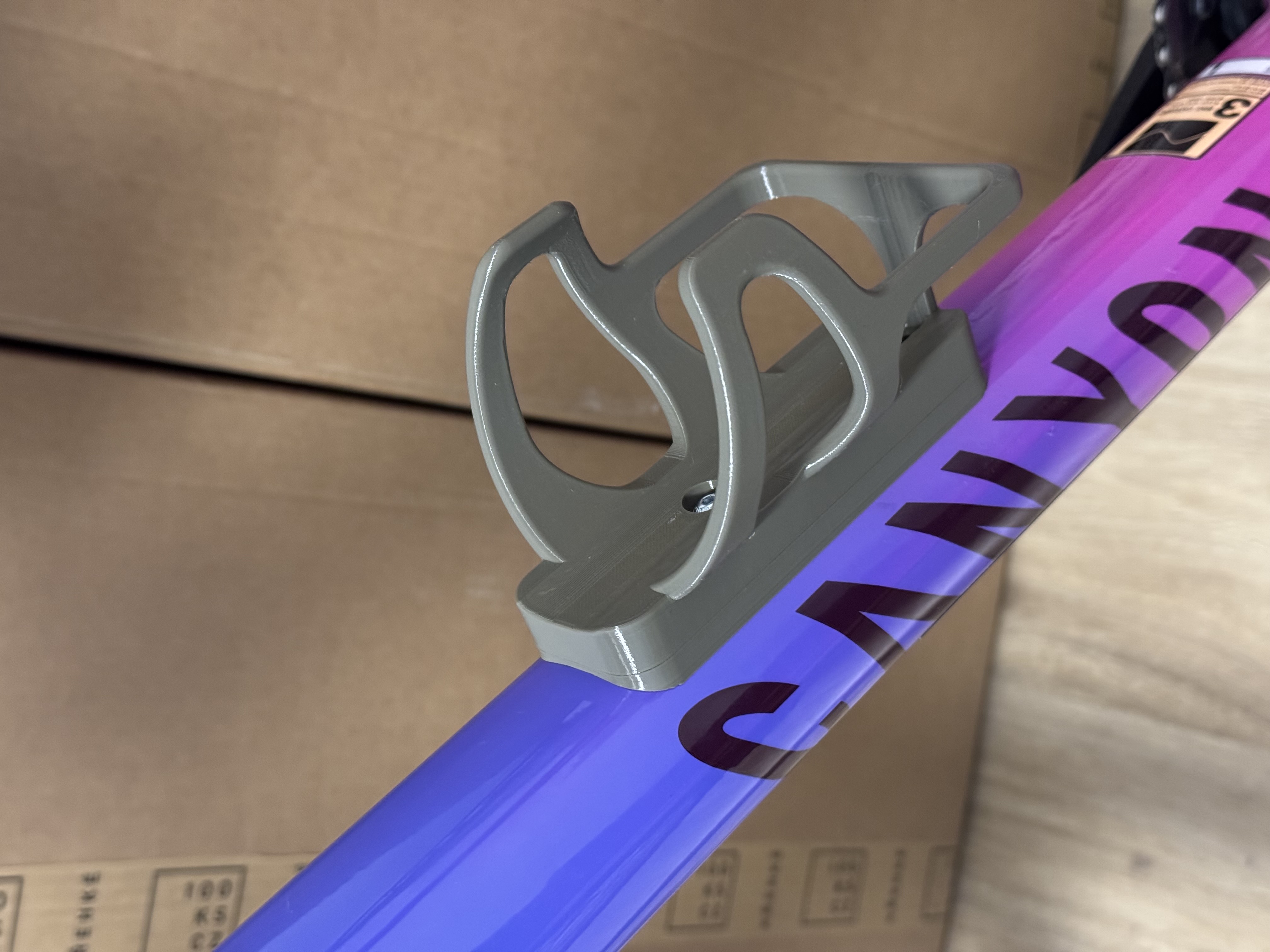 Bike bottle holder with a hidden slot for Airtag REMIXed for Canyon Exceed CF6