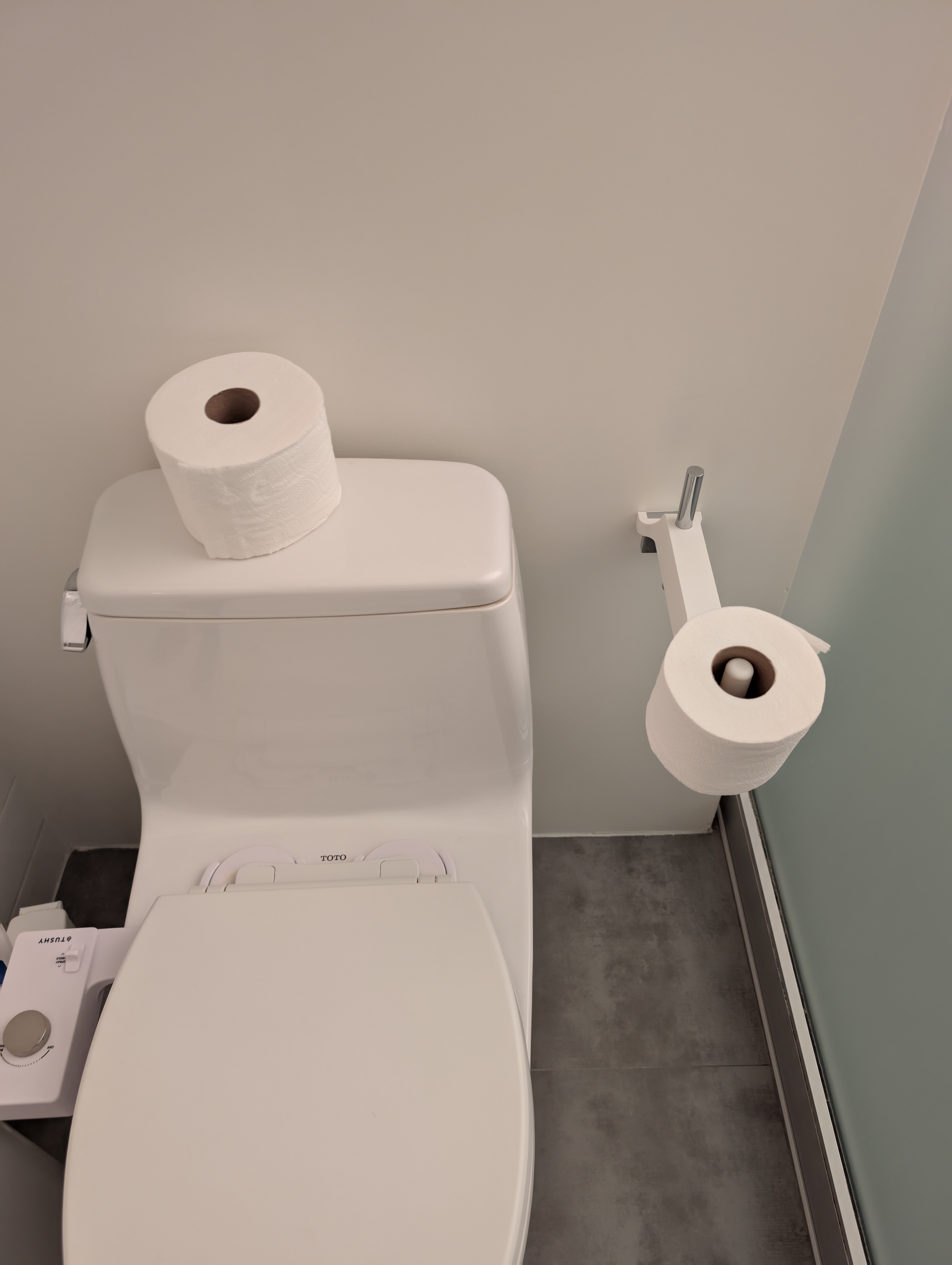 Toilet paper holder extension