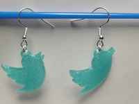 boucle d' oreille twitter