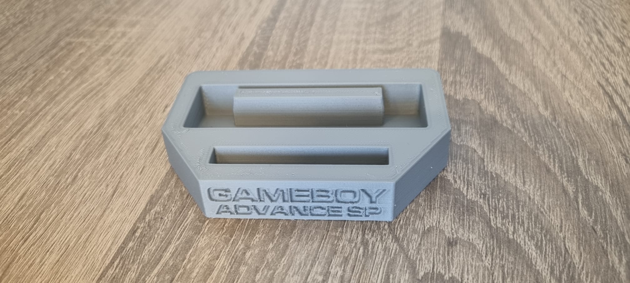 Gameboy Advance SP stand with 1 game