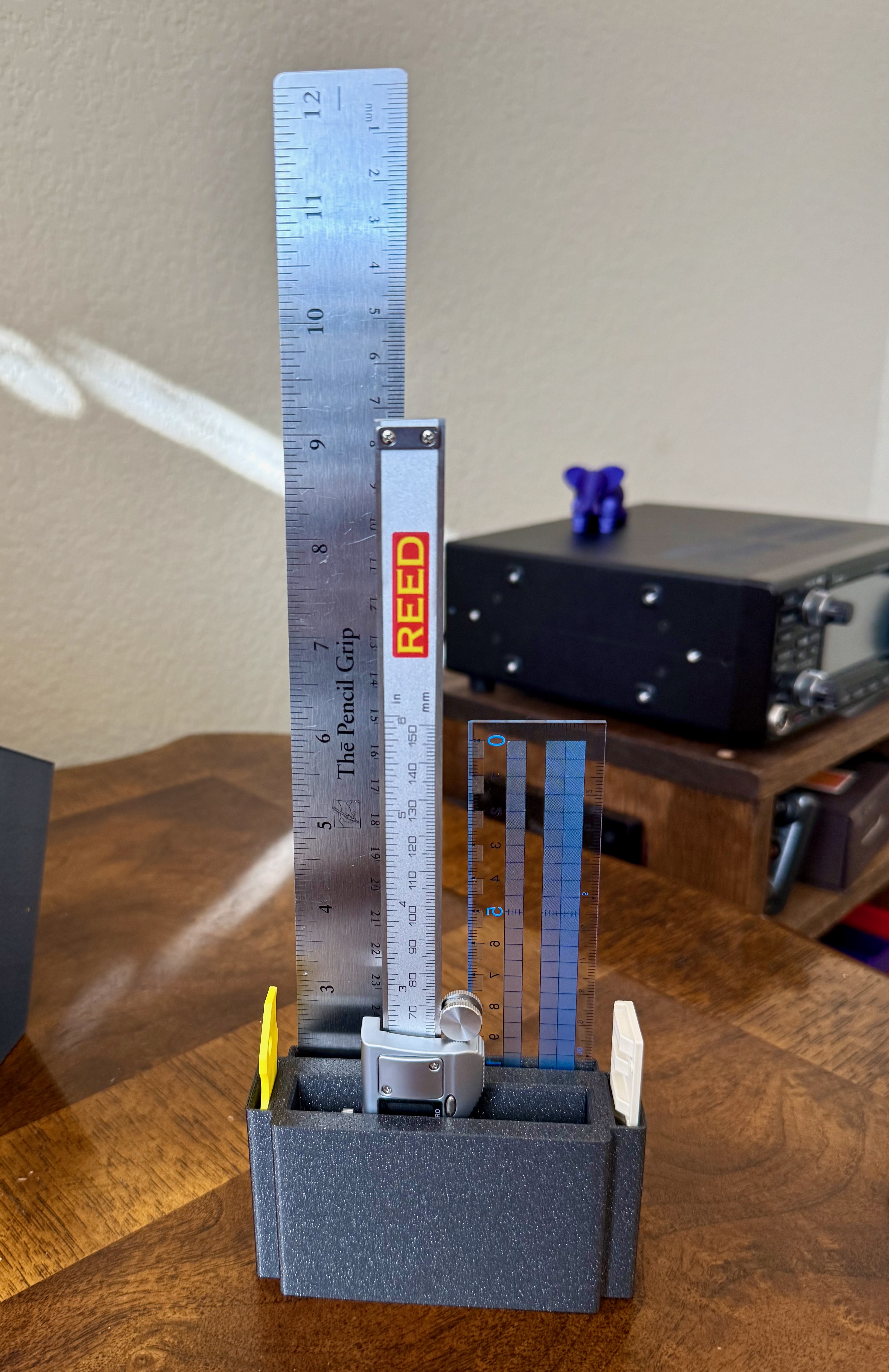 Vertical stand for calipers, rulers and gauges