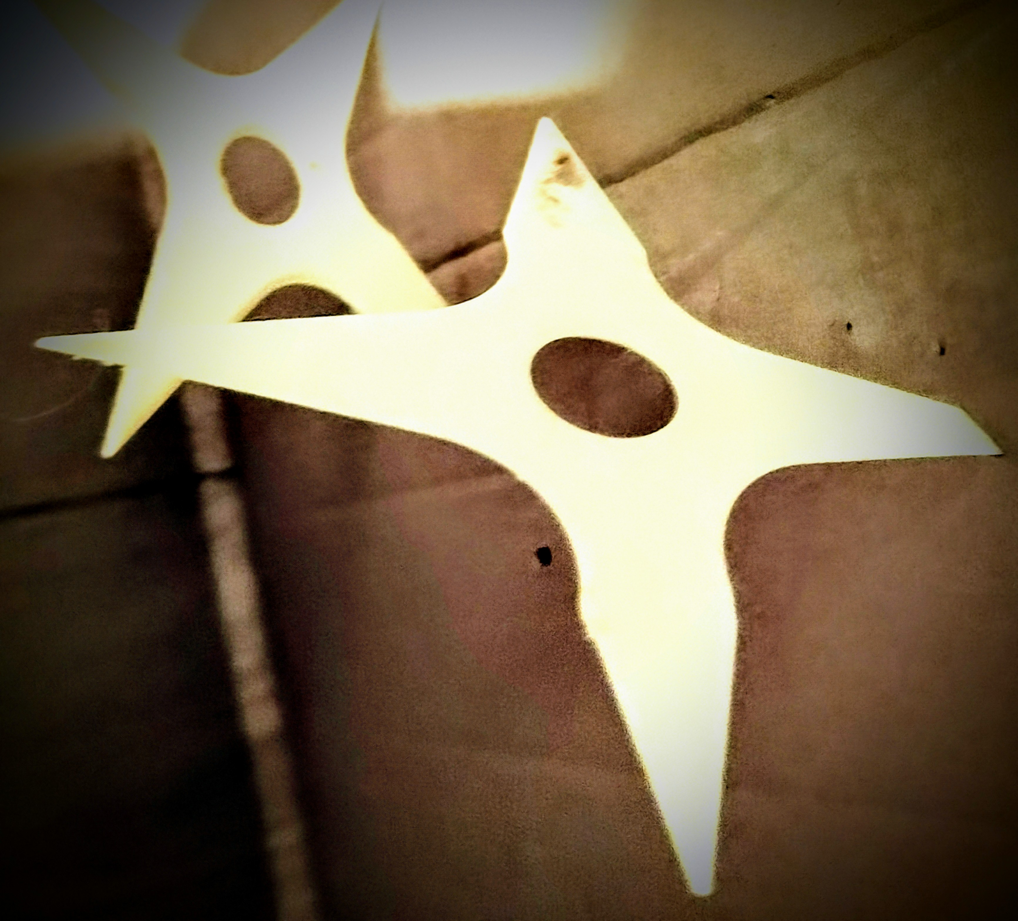 shuriken (dent in my wall)