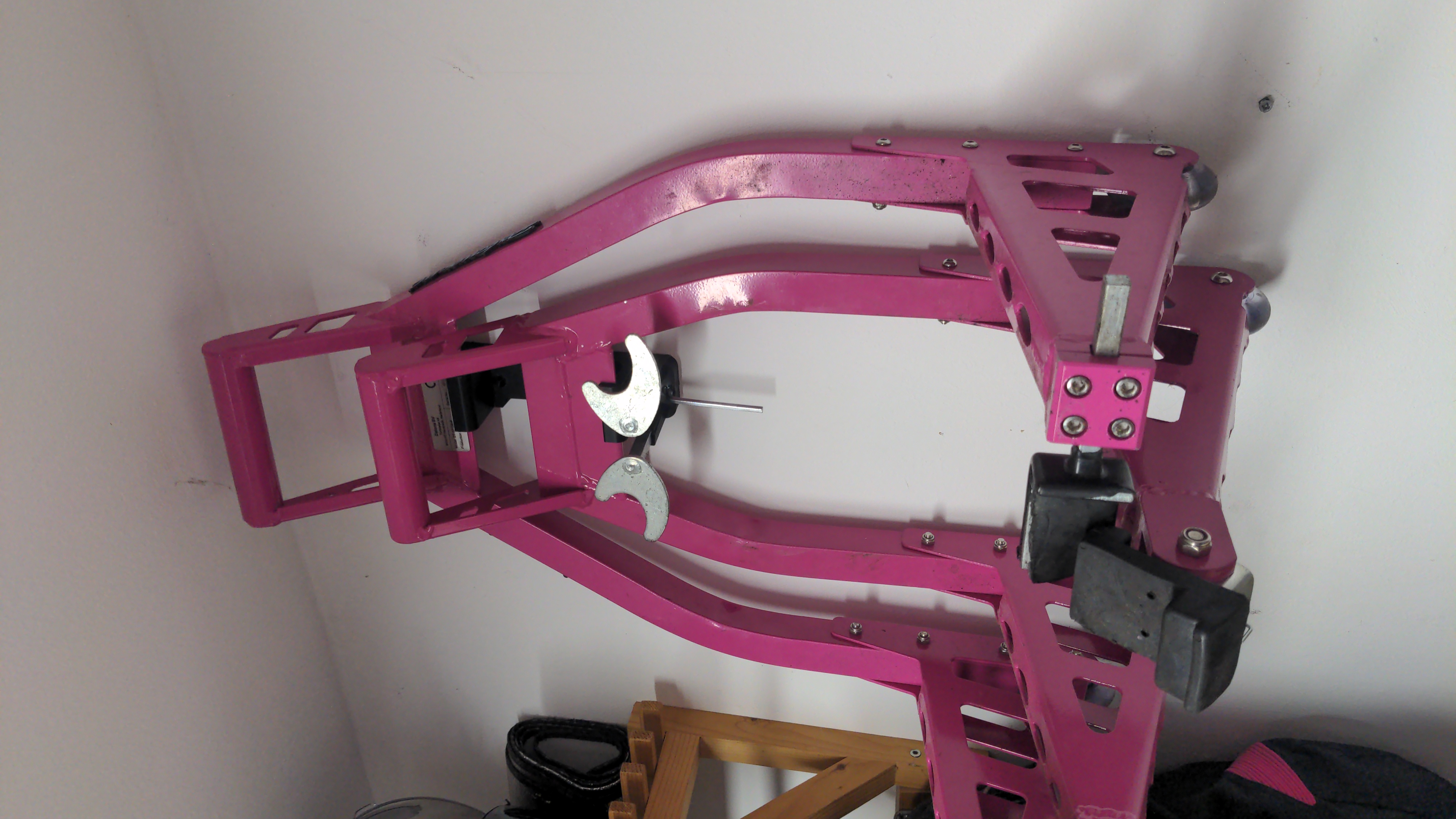 Motorcycle paddock stand wall mount