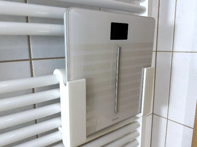 Body scale holder for towel heater (hanging edition)