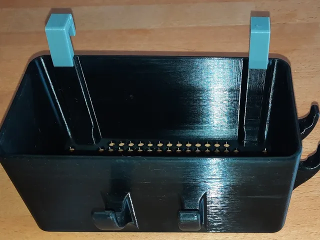 Shower shelf in 2 component technology