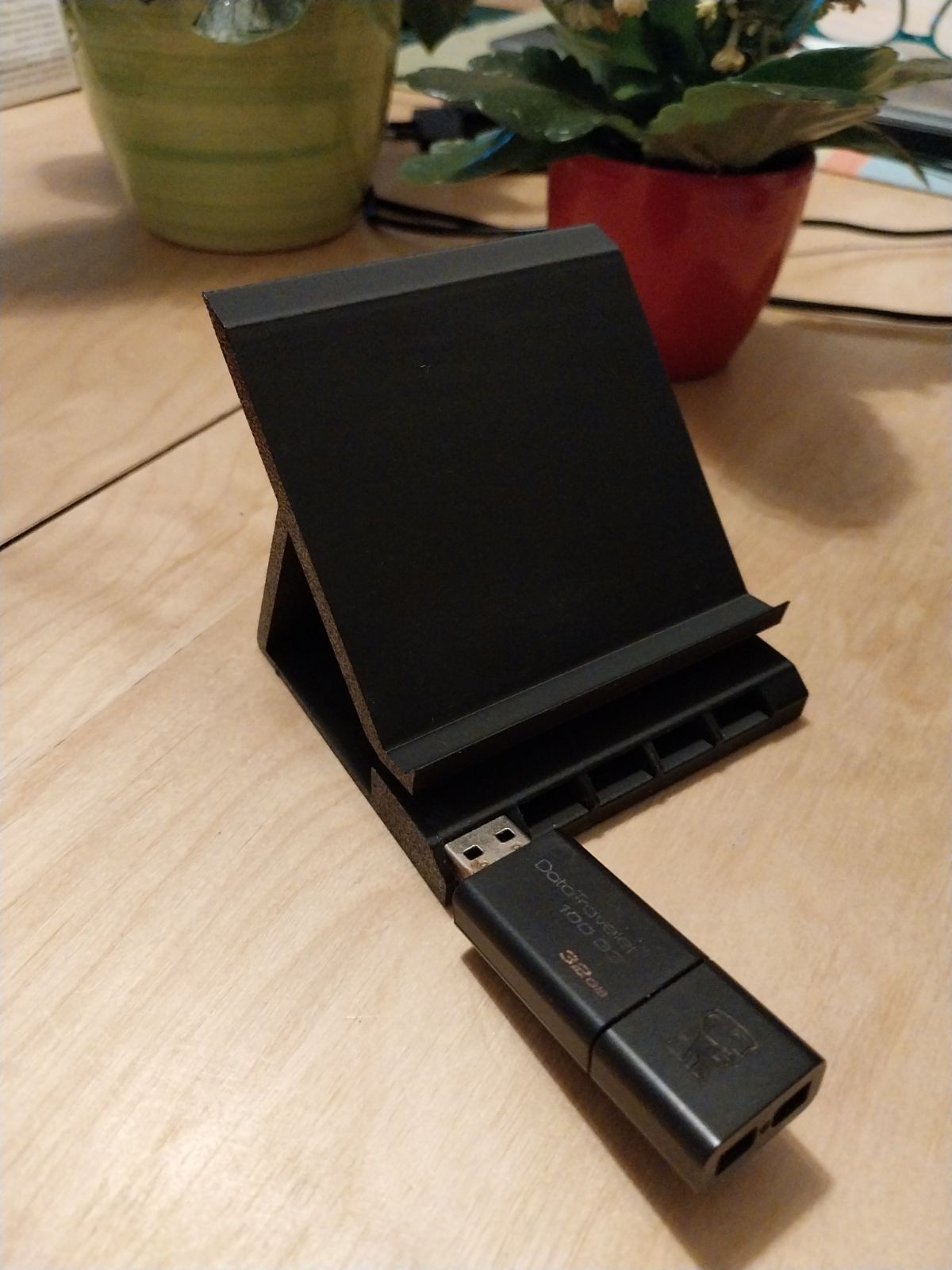 Simple phone stand with usb holders