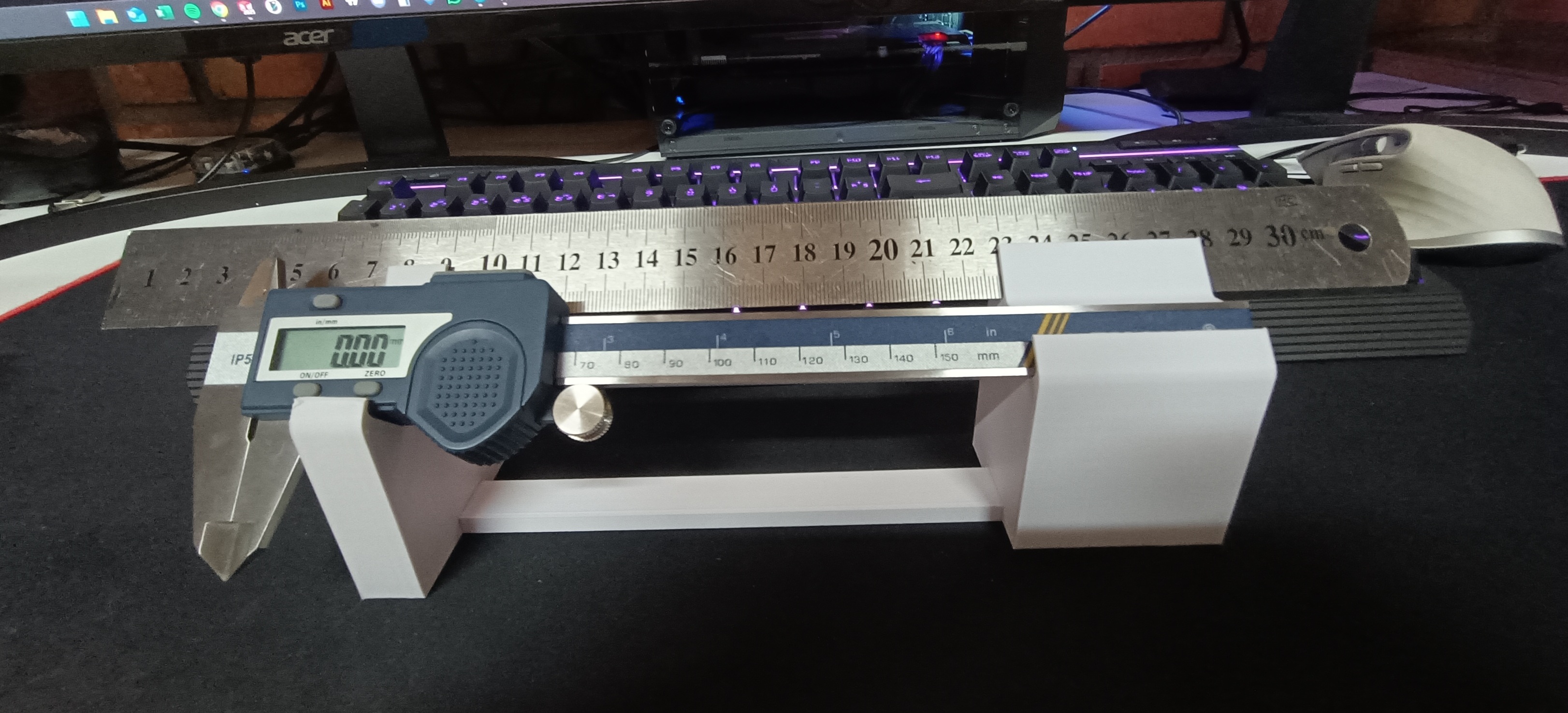 Ruler and caliper support for desk